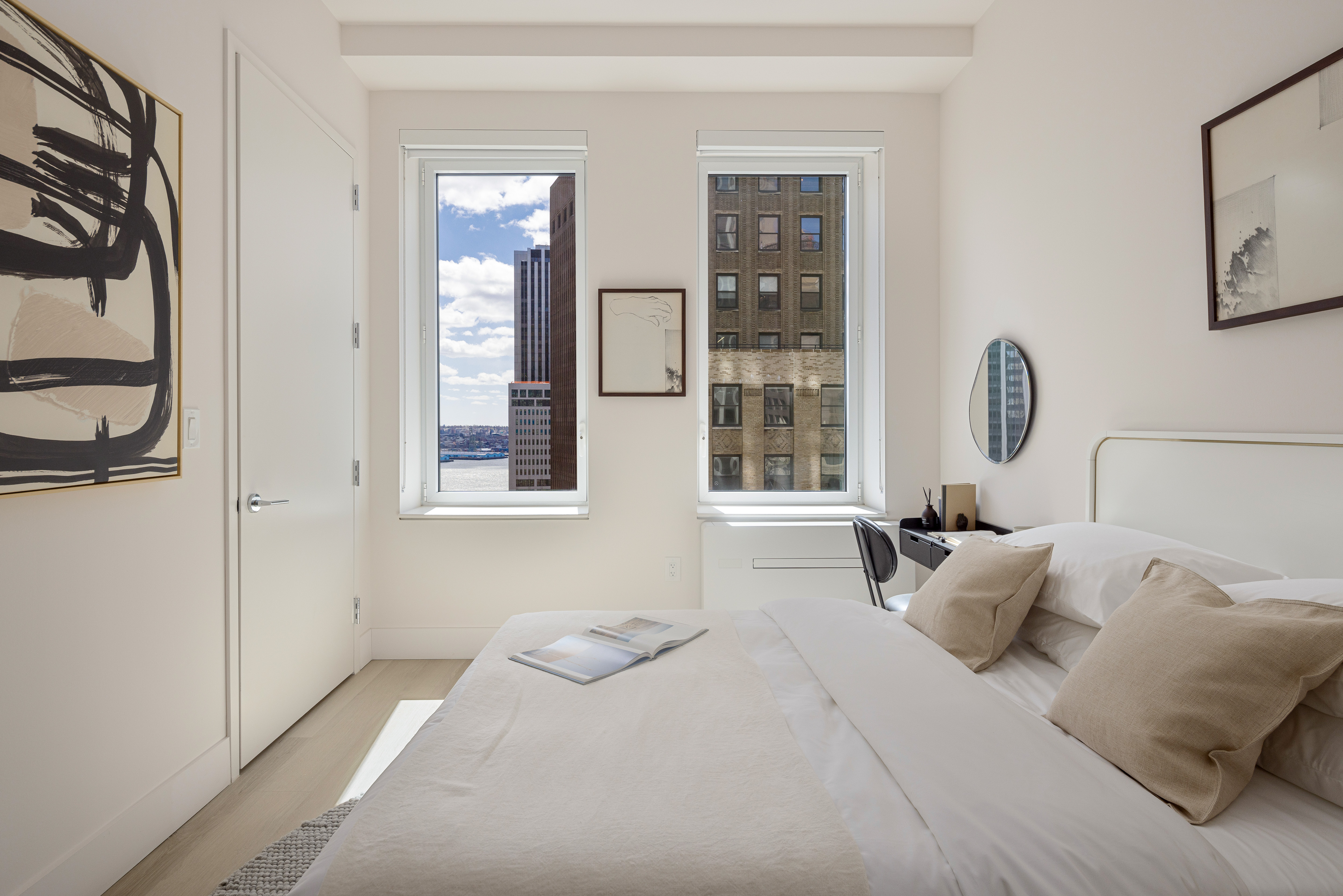 a bedroom with a bed and window