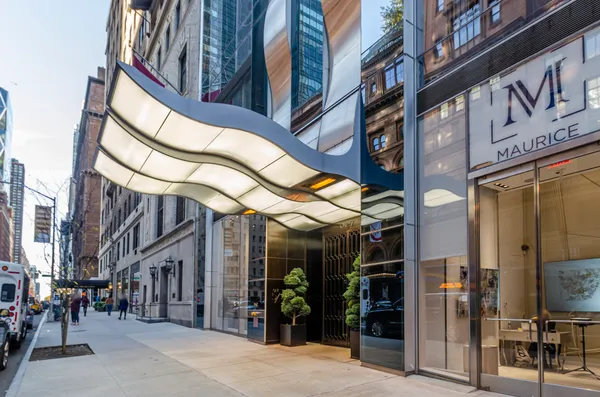 a view of a building on a street