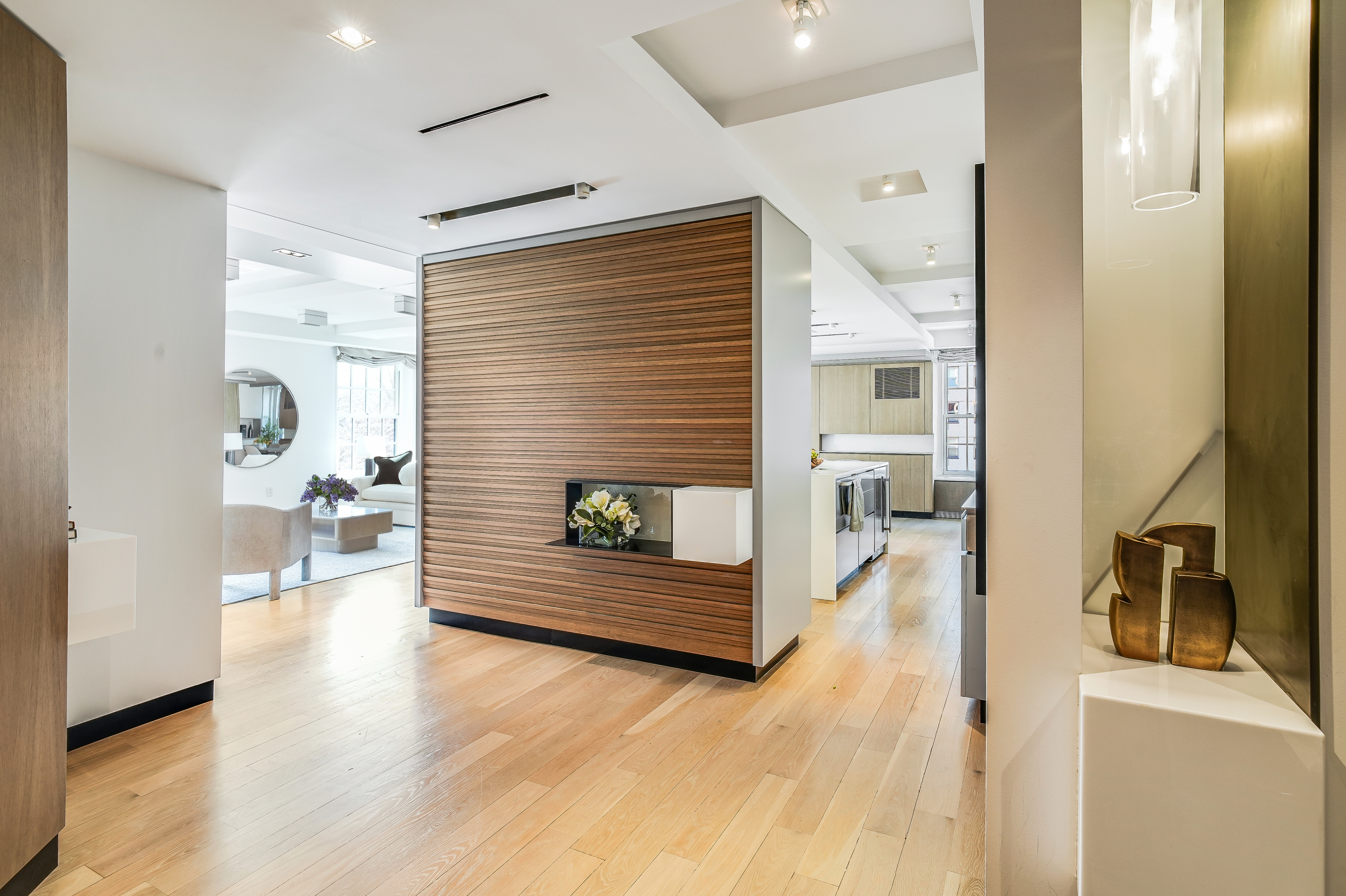1 5th Avenue, Unit 5GH Manhattan, NY 10003 - Photo 10 of 26 a view of a hallway view with wooden floor and staircase
