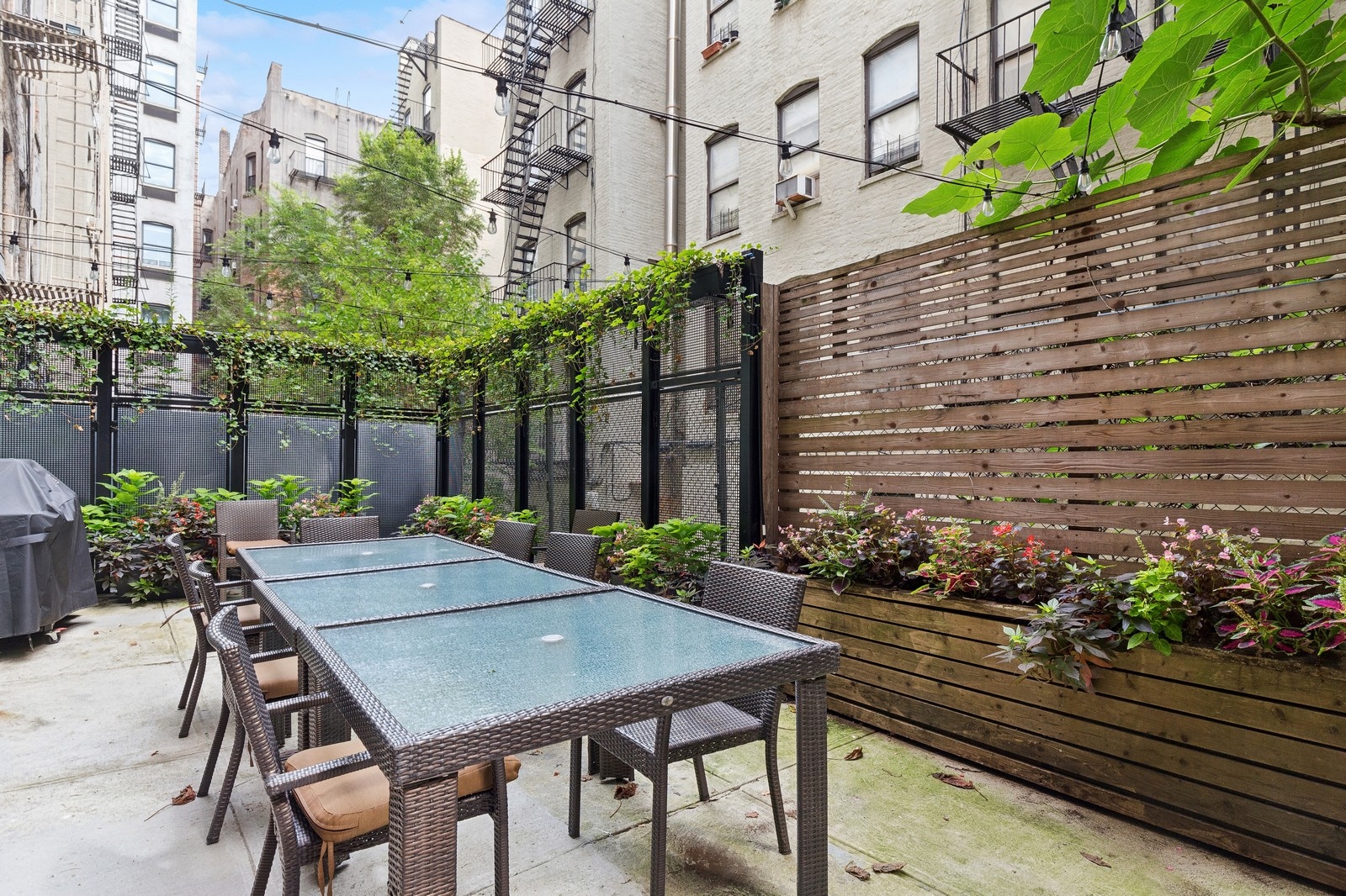 307 West 111th Street, Unit 2R Manhattan, NY 10026 - Photo 9 of 16 a view of a house with backyard and sitting area