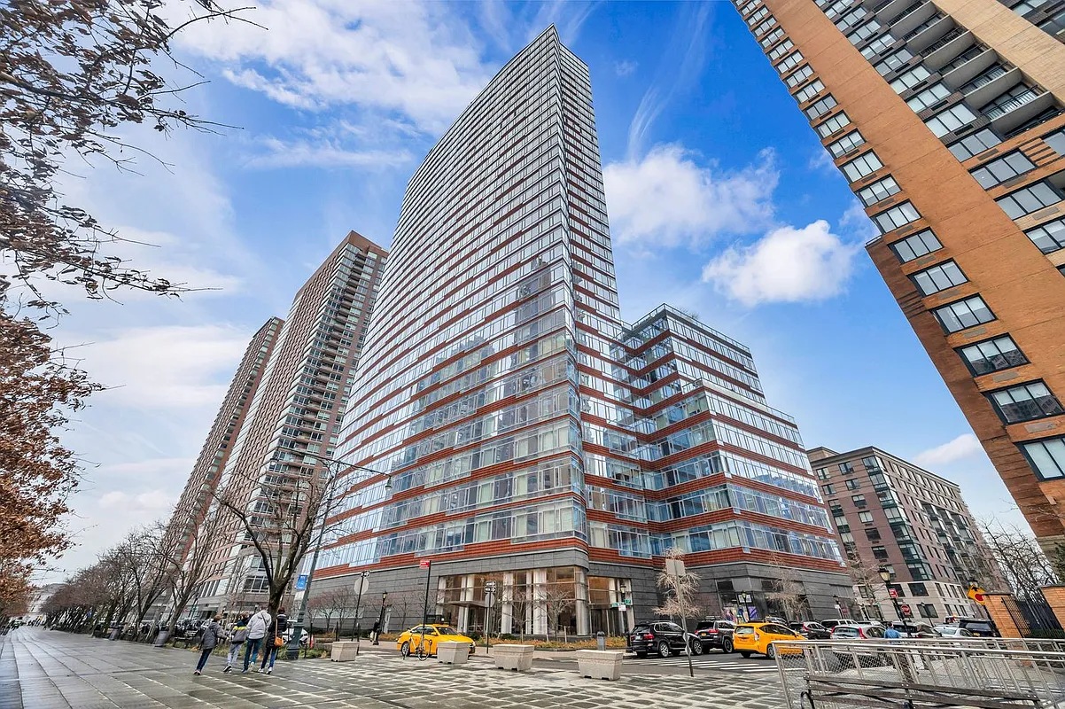 70 Little West Street, Unit 15A Manhattan, NY 10004 - Photo 18 of 19 a front view of a building