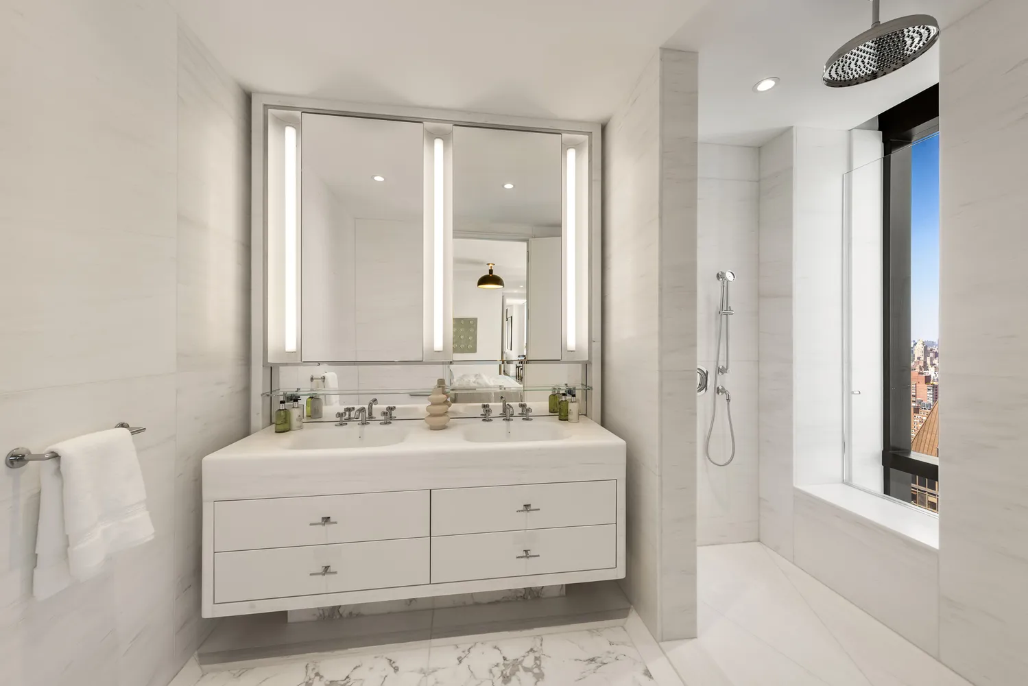 a bathroom with a double vanity sink mirror and double