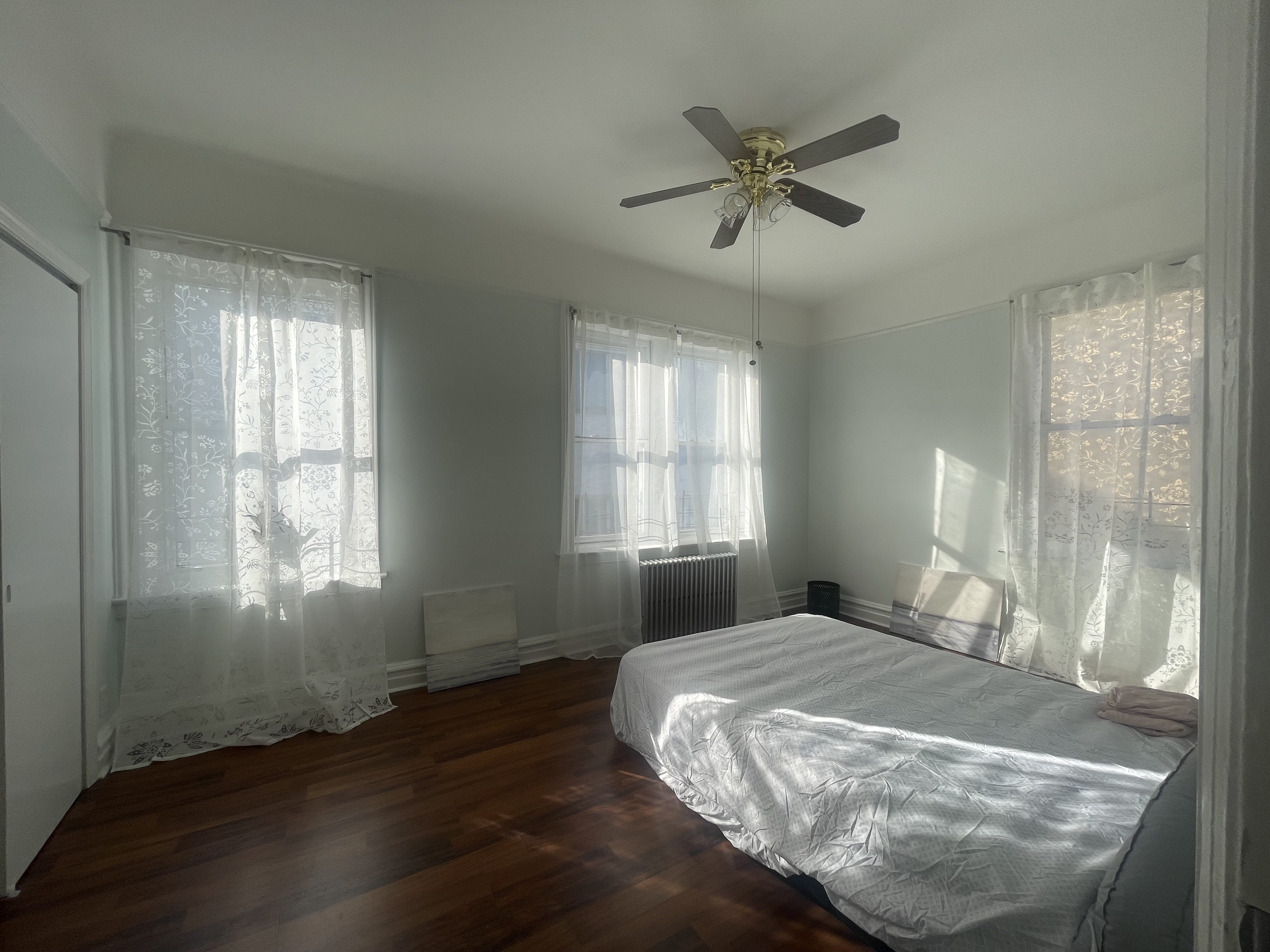 2446 Bedford Avenue, Unit 1 Brooklyn, NY 11226 - Photo 14 of 15 a bedroom with a bed and window