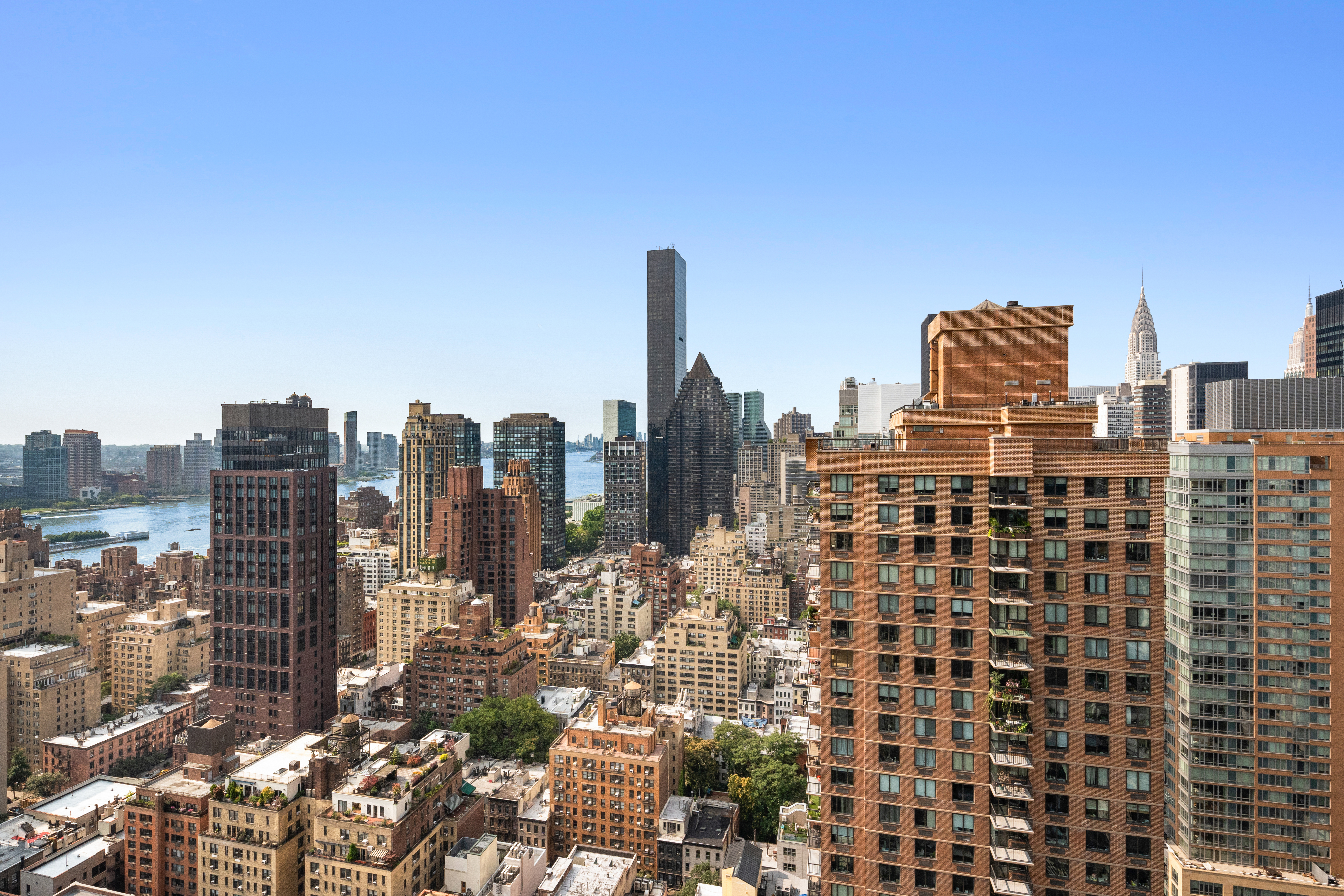 300 East 55th Street, Unit PHC Manhattan, NY 10022 - Photo 8 of 23 a view of a city with tall buildings