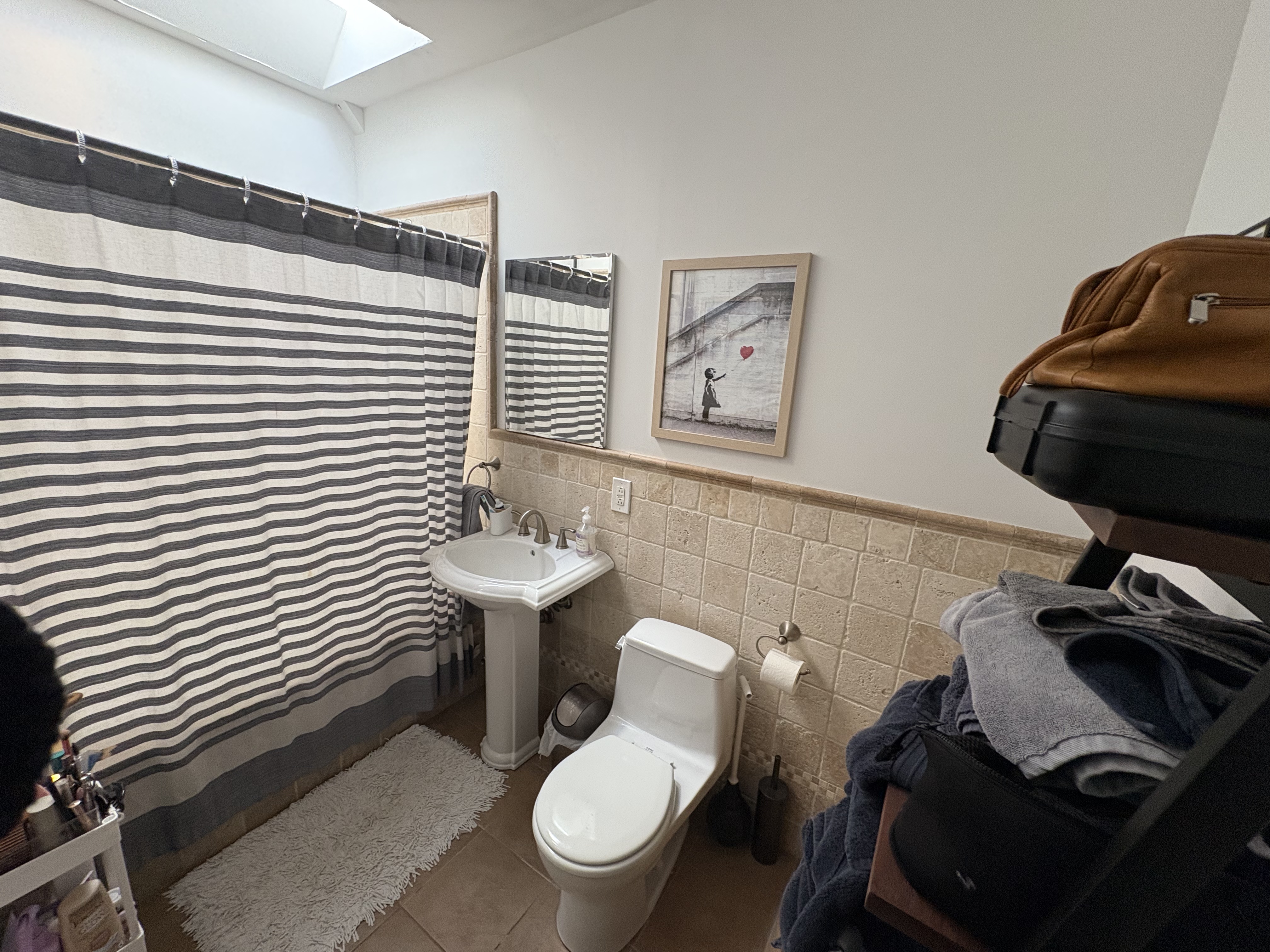 304 7th Avenue, Unit 3 Brooklyn, NY 11215 - Photo 12 of 15 a bathroom with a toilet and a sink