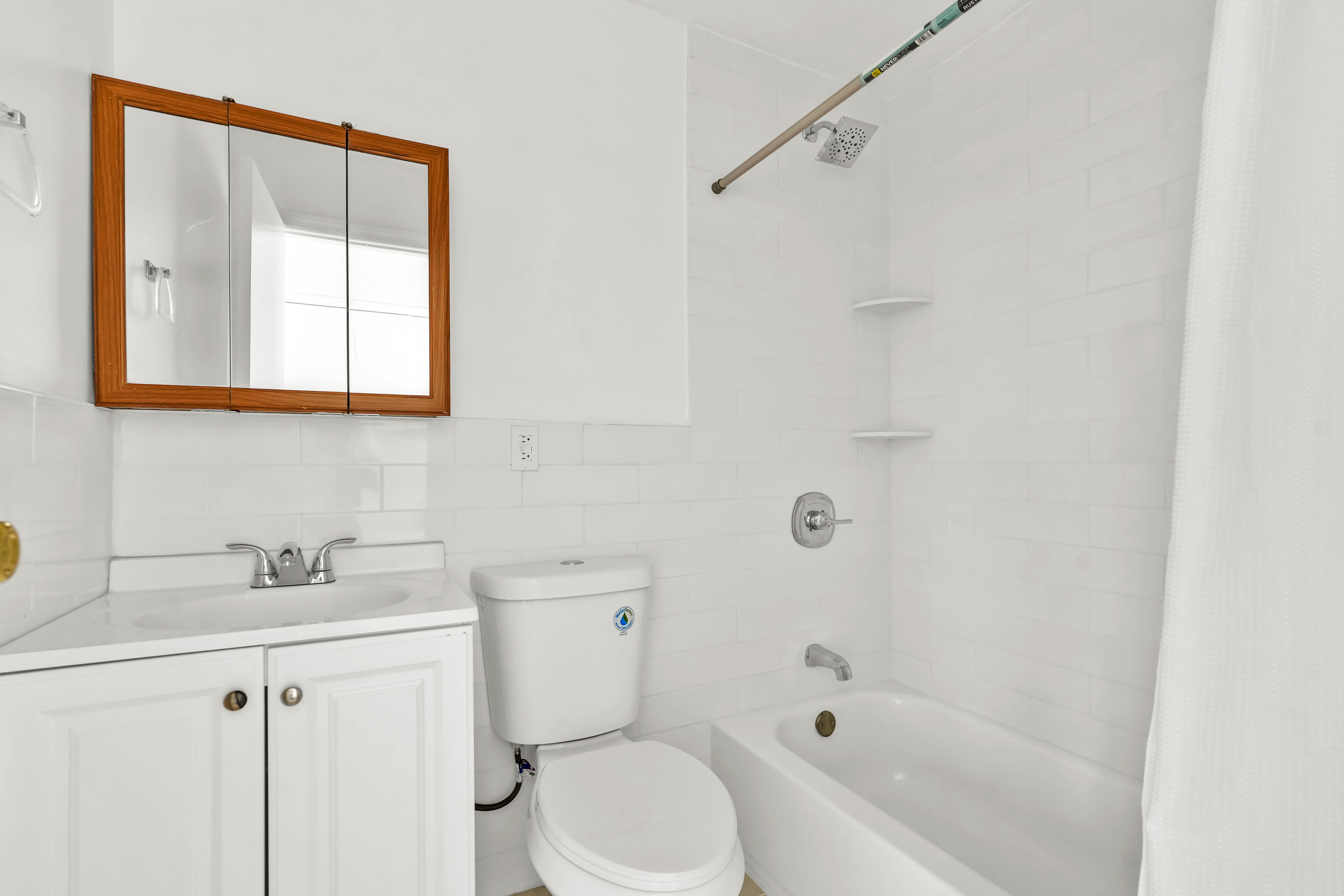238 Vernon Avenue, Unit 3 Brooklyn, NY 11206 - Photo 12 of 19 a bathroom with a sink toilet and shower