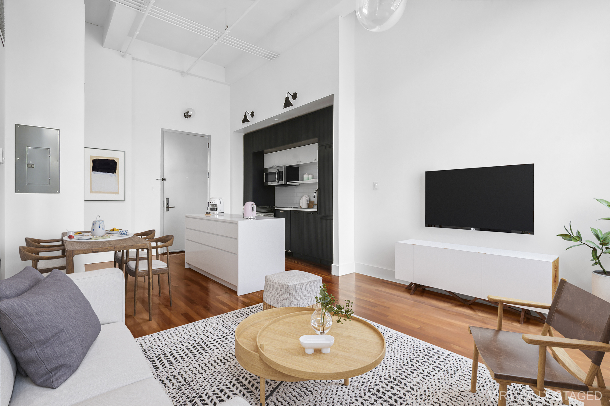 180 Bainbridge Street, Unit 305 Brooklyn, NY 11233 - Photo 2 of 23 a living room with furniture and a flat screen tv