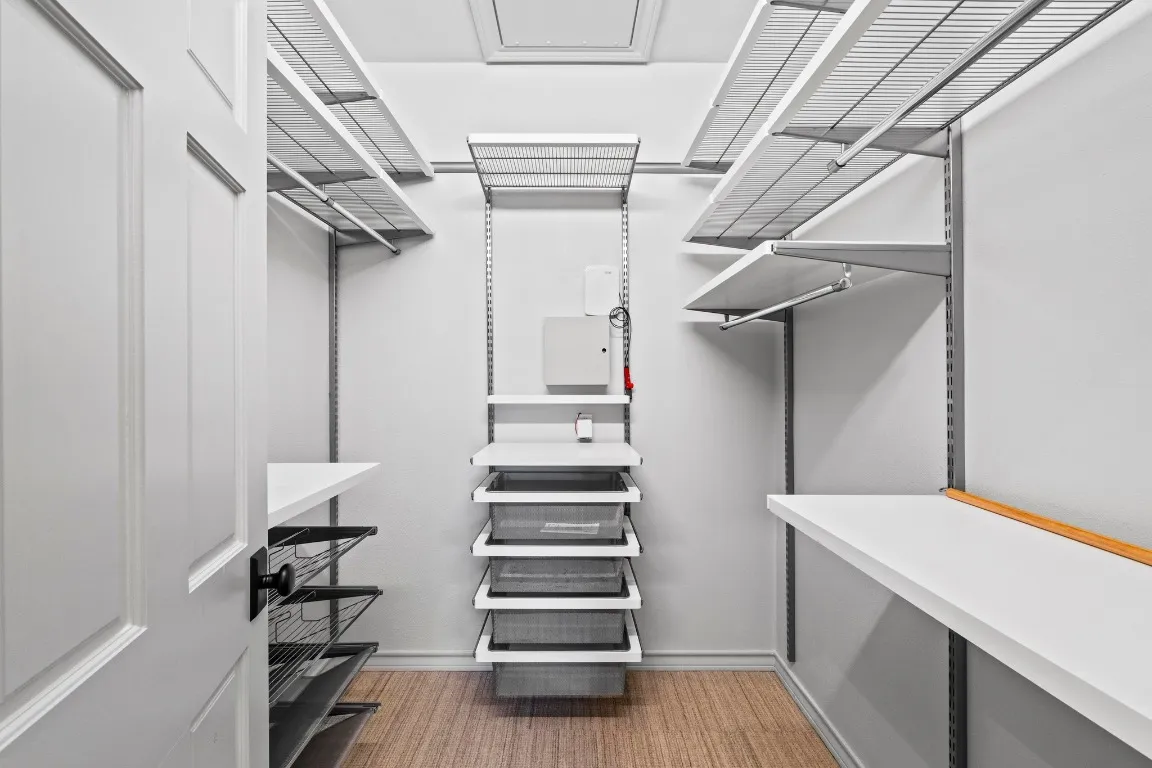 a bathroom with a sink a toilet and a window