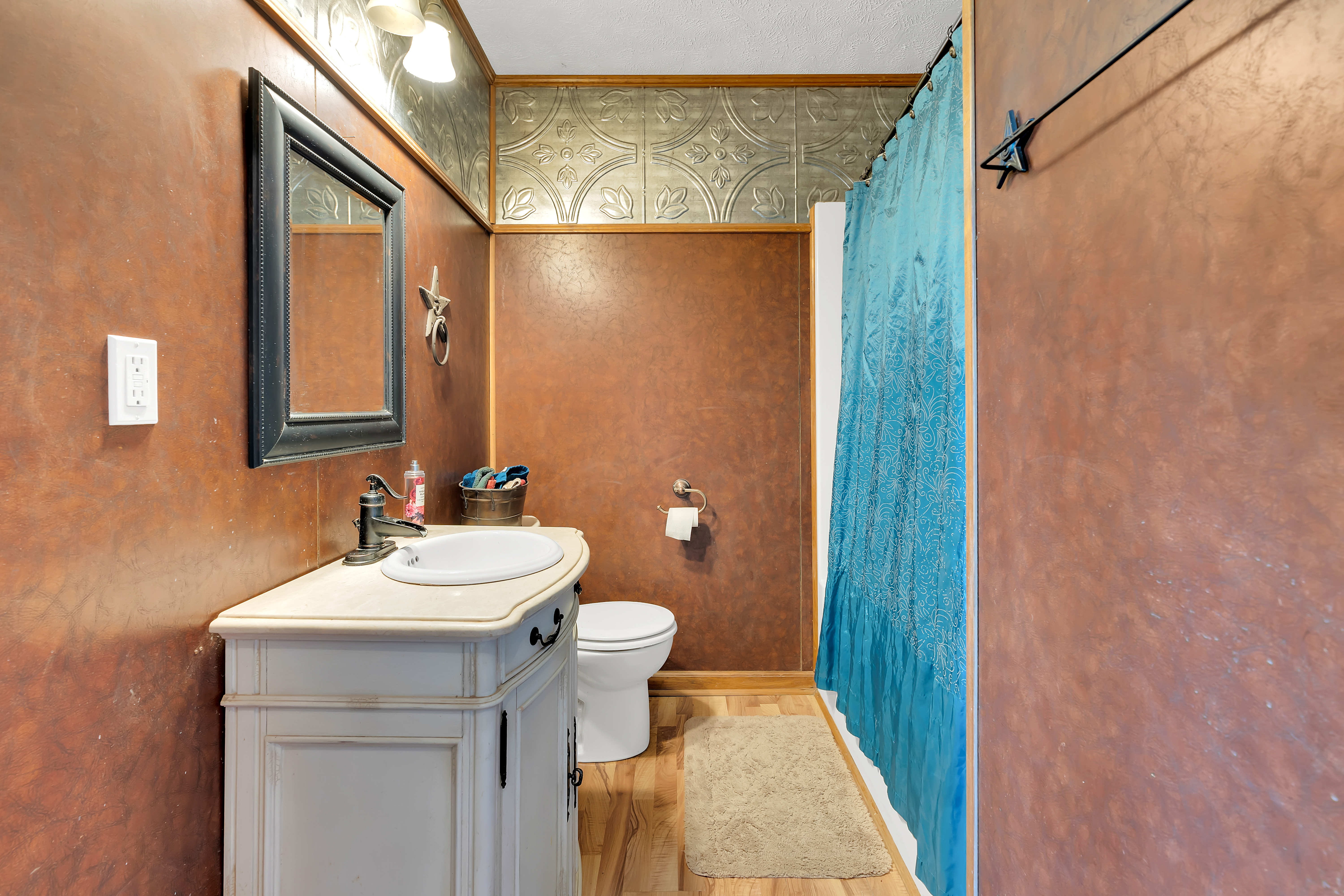 2073 Harpo Road Manchester, TN 37355 - Photo 40 of 45 a bathroom with a sink a toilet a mirror and shower