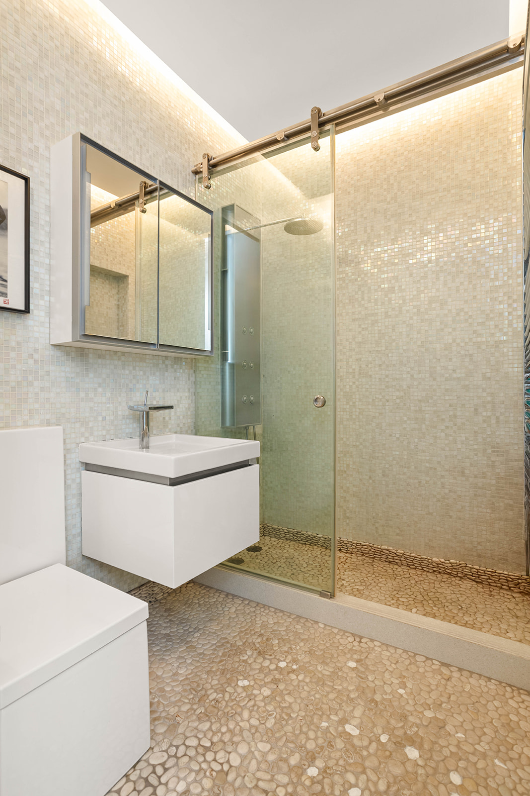 244 West 23rd Street, Unit 3A Manhattan, NY 10011 - Photo 9 of 11 a bathroom with a bathtub and a shower