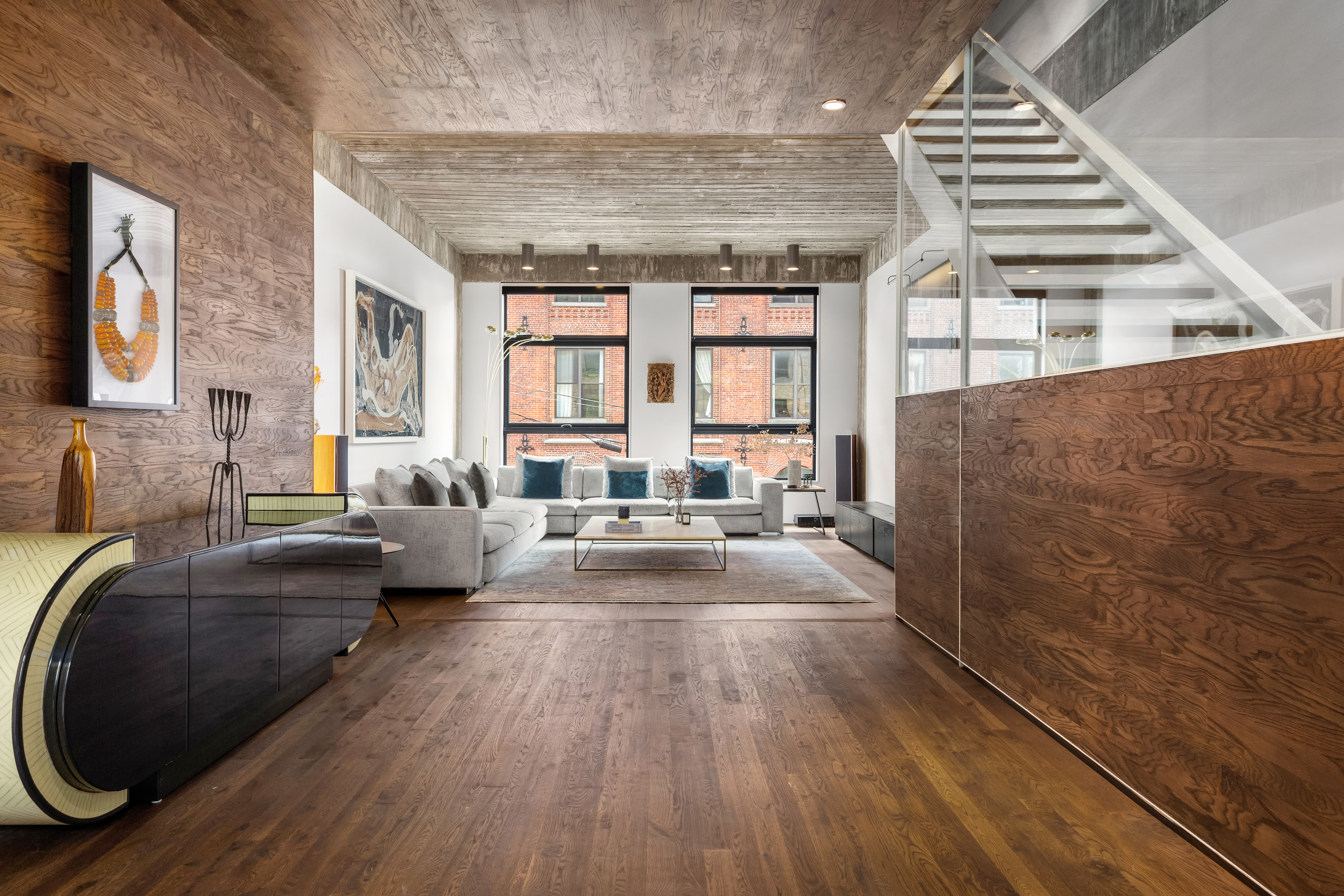 3 Wythe Lane Brooklyn, NY 11249 - Photo 12 of 30 a living room with furniture and a large window