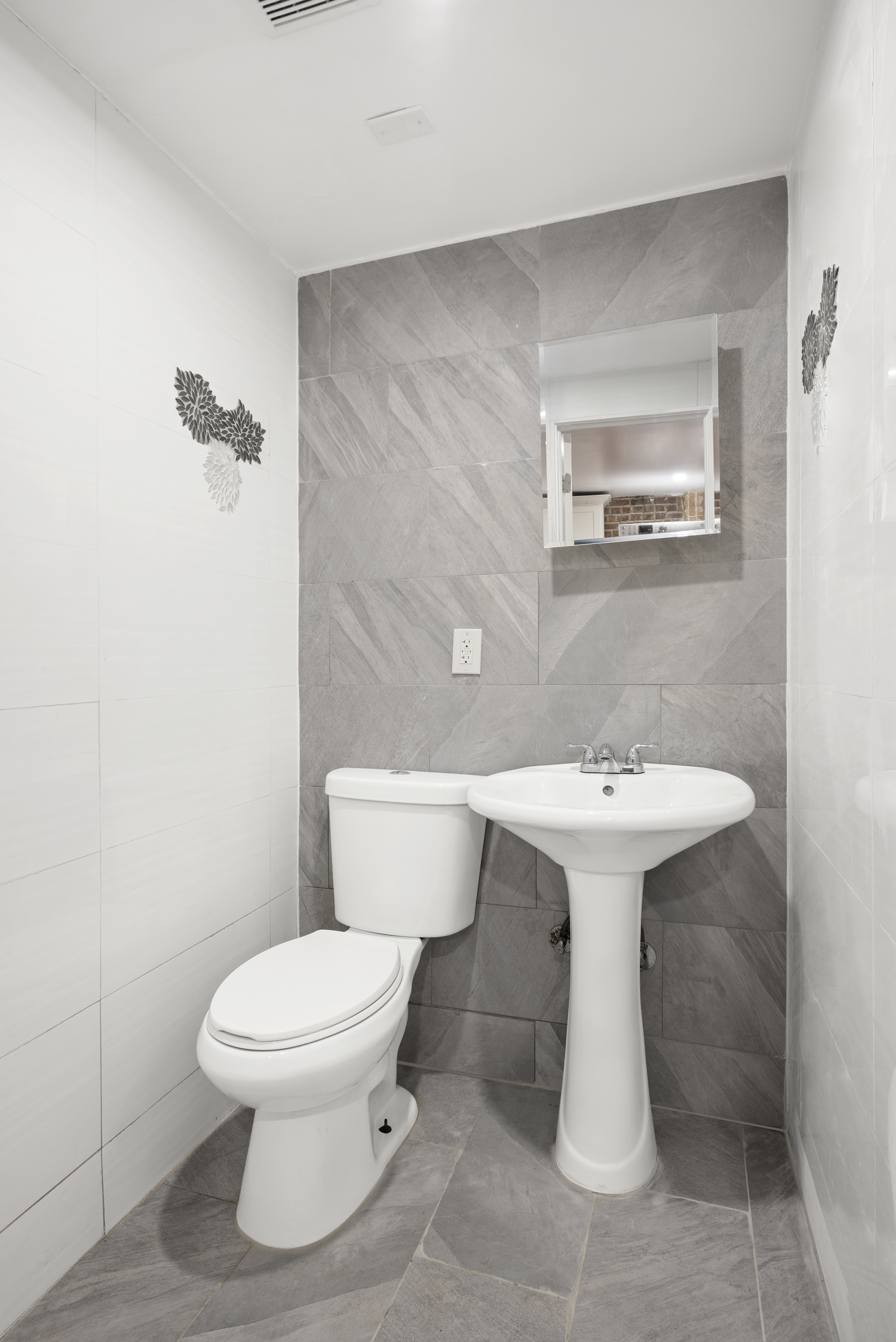 654 Lafayette Avenue, Unit GARDENA Brooklyn, NY 11216 - Photo 11 of 14 a white toilet sitting next to a white sink