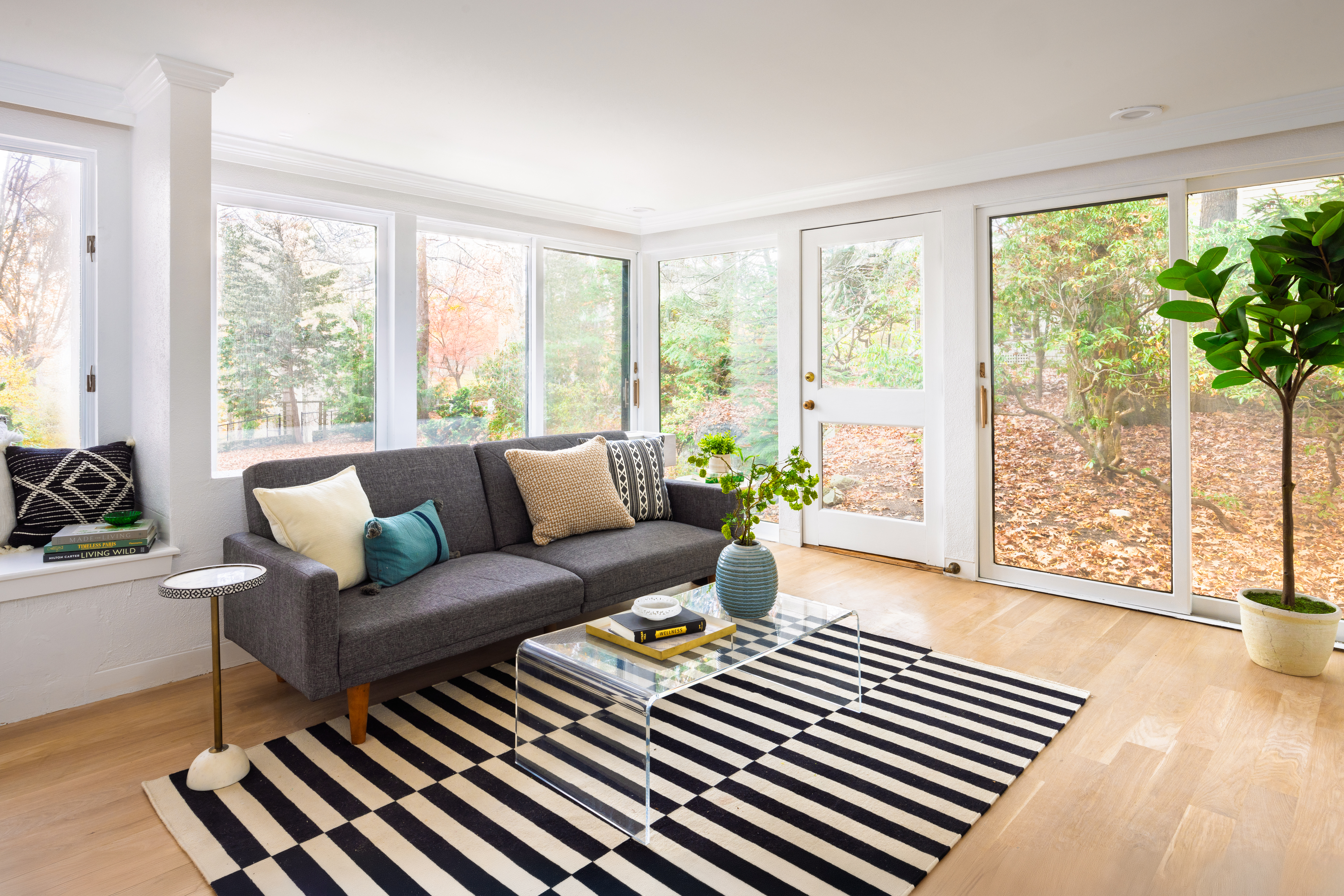 111 Beverly Road Brookline, MA 02467 - Photo 12 of 27 a living room with furniture and a large window