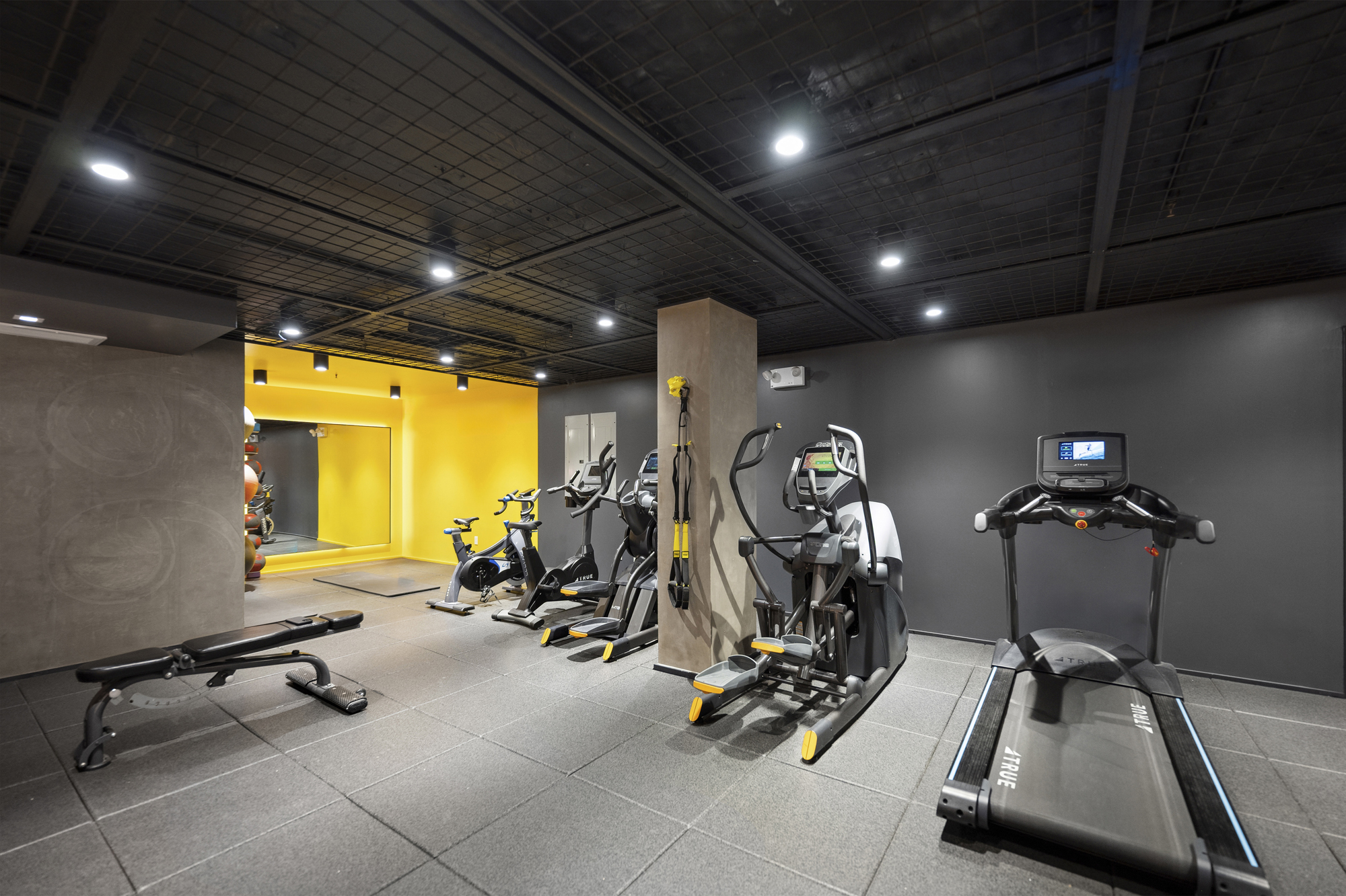 99 Jane Street, Unit 4H Manhattan, NY 10014 - Photo 18 of 22 a view of a room with gym equipment