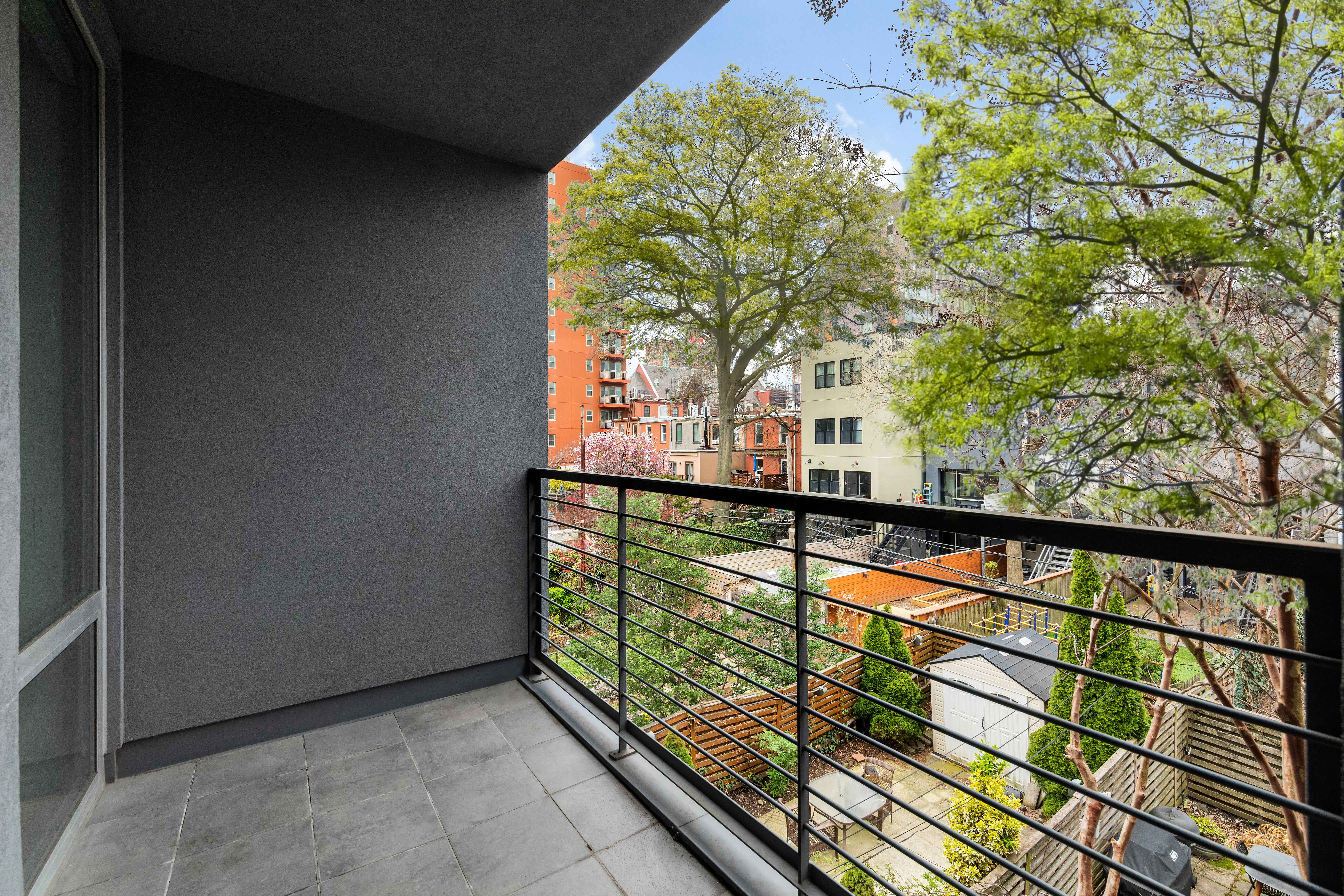232 7th Street, Unit 3B Brooklyn, NY 11215 - Photo 4 of 7 a view of balcony with a tree