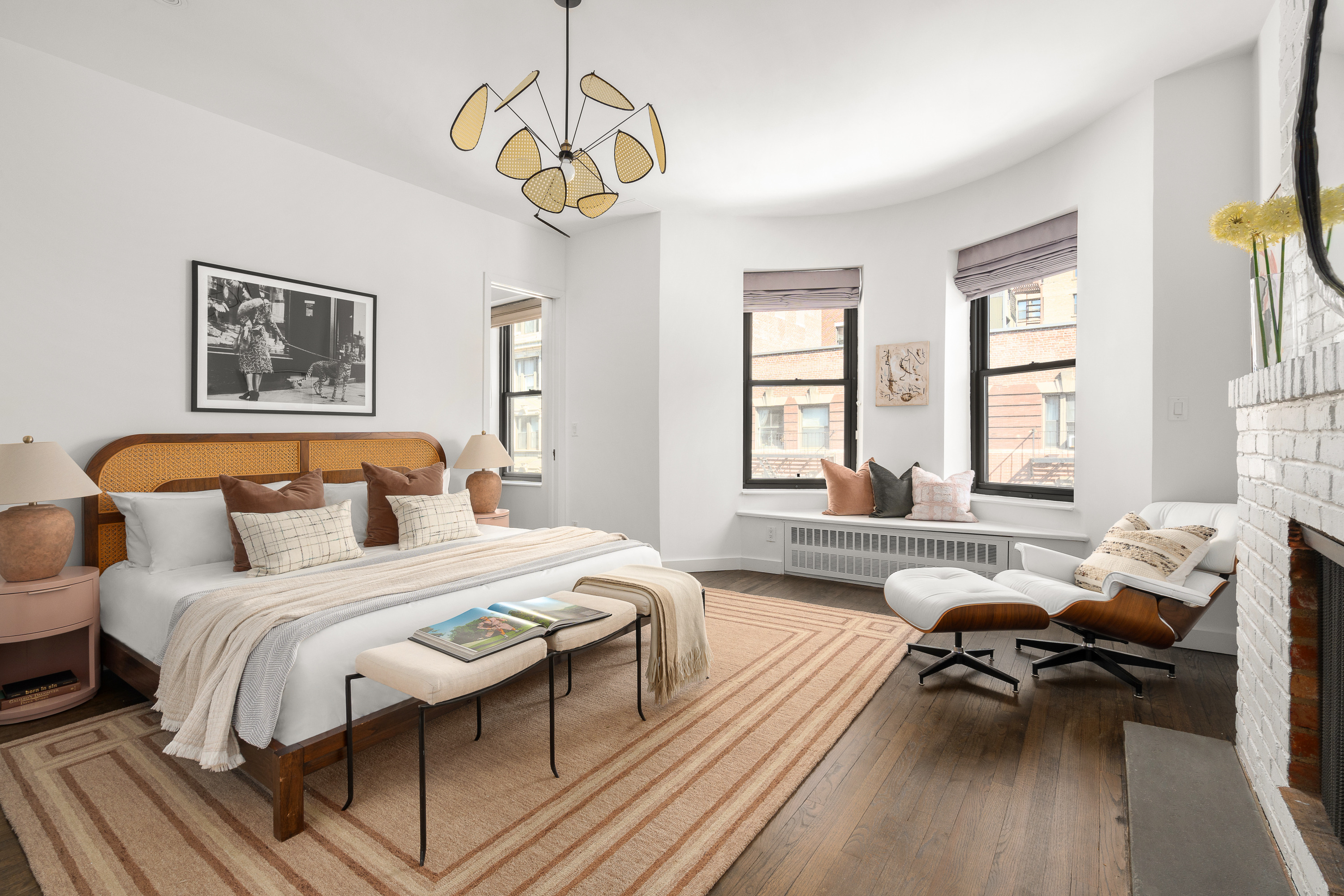 342 West 85th Street, Unit PH6AB Manhattan, NY 10024 - Photo 8 of 17 a bedroom with a bed and a chandelier