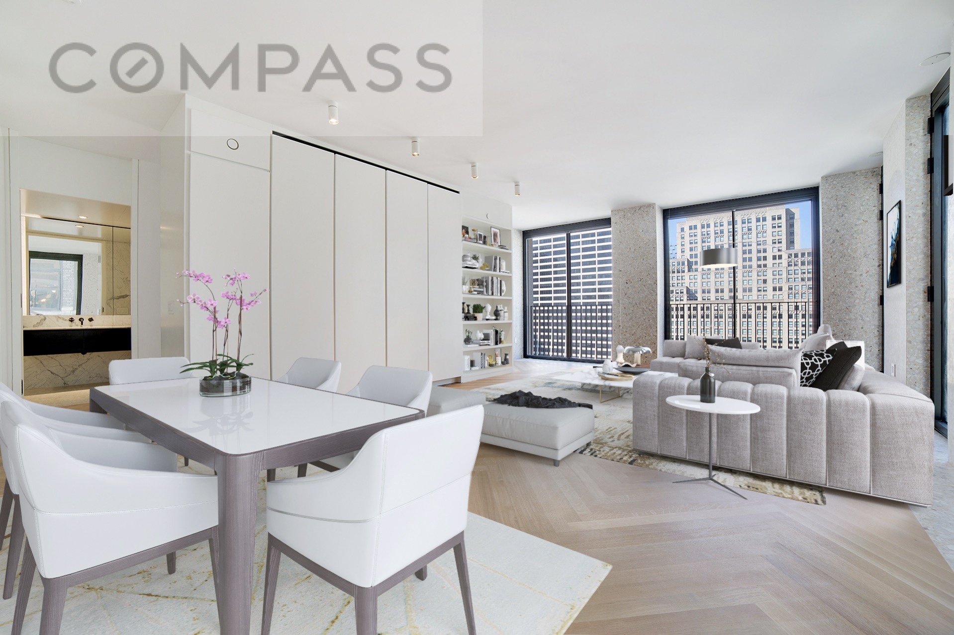 16 West 40th Street, Unit 21B Manhattan, NY 10018 - Photo 7 of 18 a view of a livingroom with furniture and window