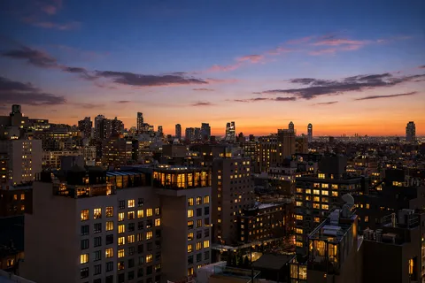 a bathroom with a sink a mirror and a bathtub