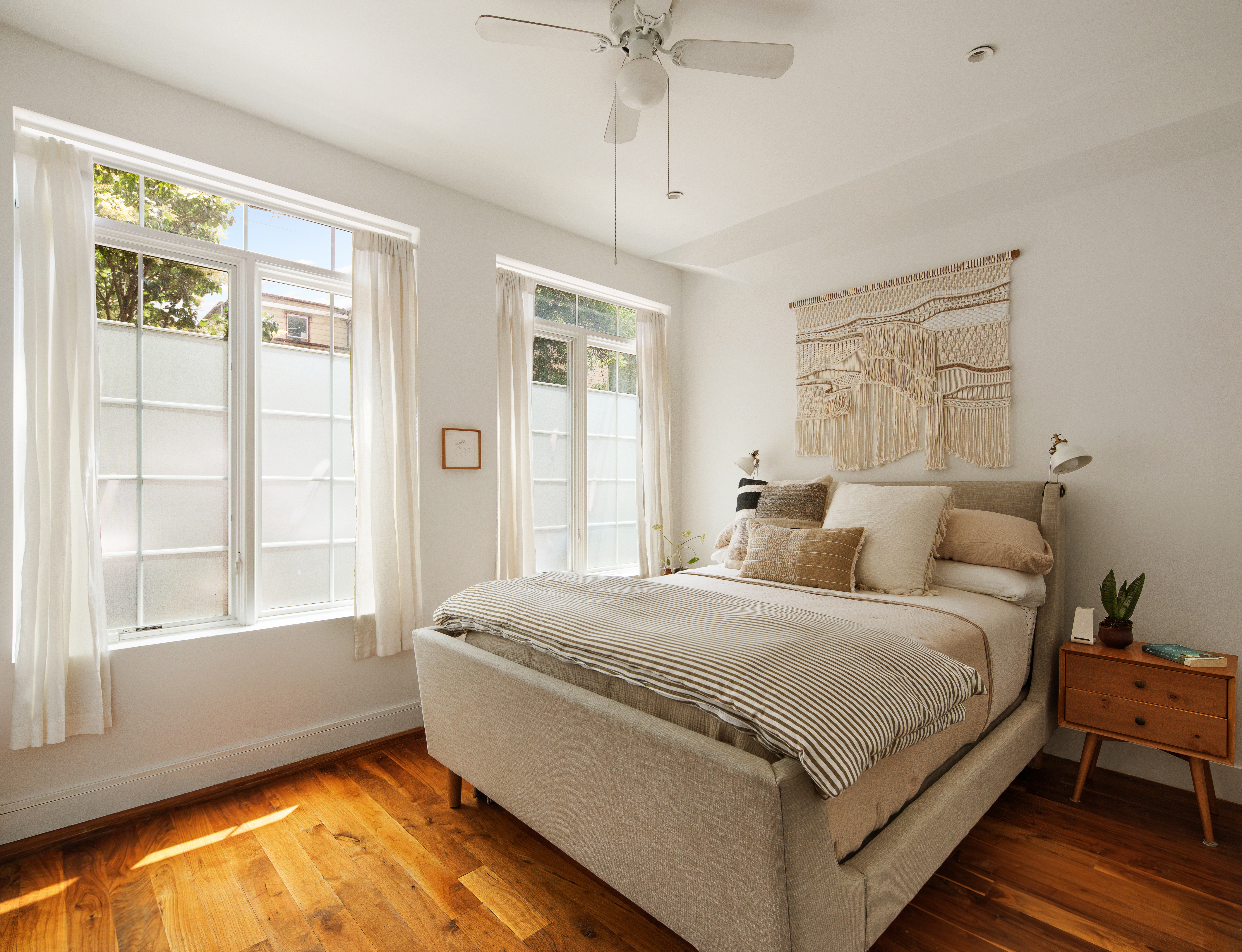 161 Jackson Street, Unit 1 Brooklyn, NY 11211 - Photo 5 of 11 a bedroom with a bed and a window