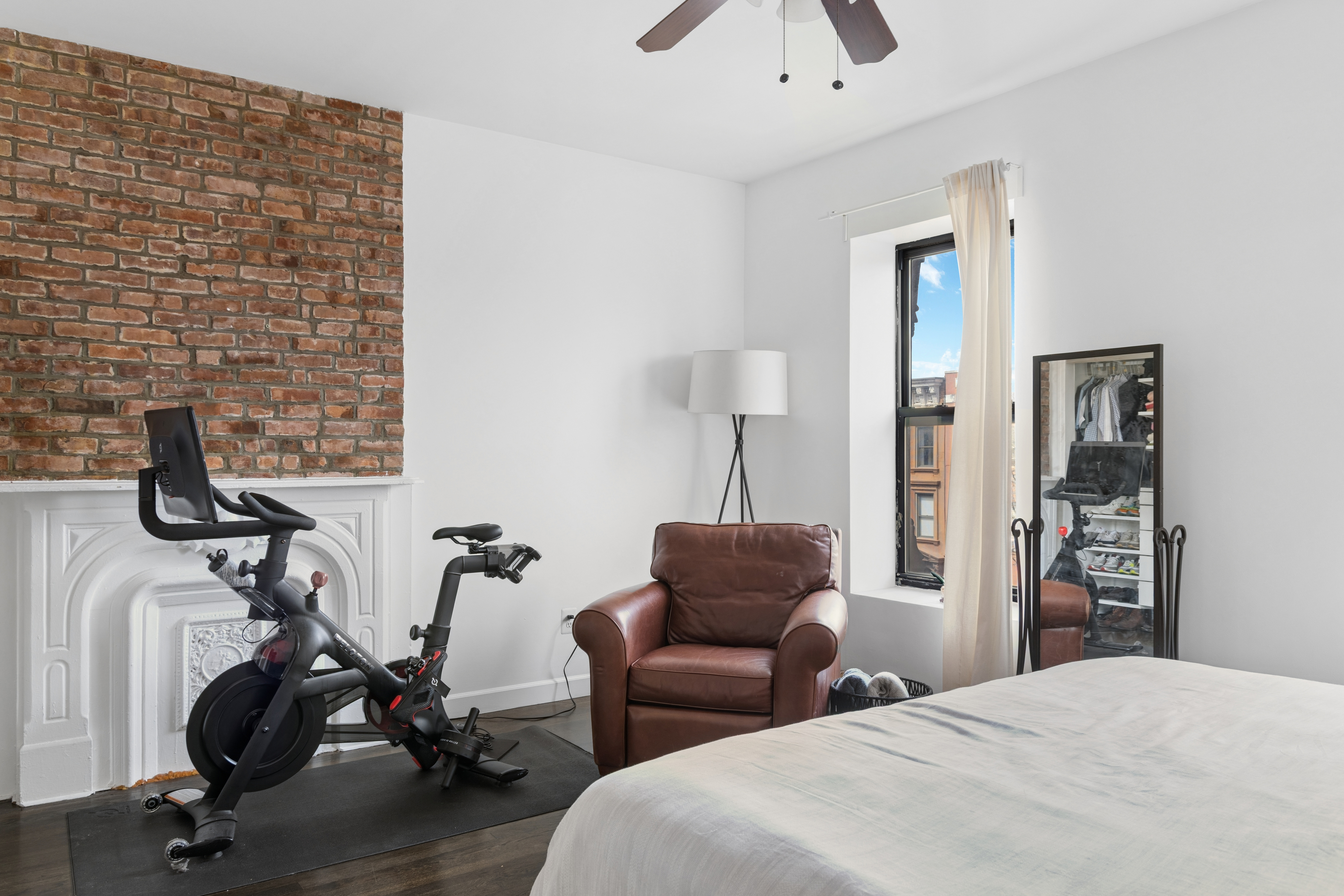38 Halsey Street, Unit 3 Brooklyn, NY 11216 - Photo 5 of 9 a bedroom with furniture a bed and wooden floor