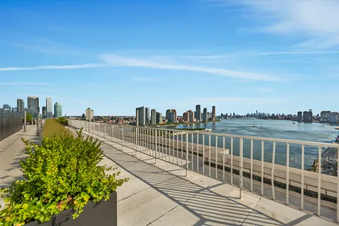 a view of city with ocean view