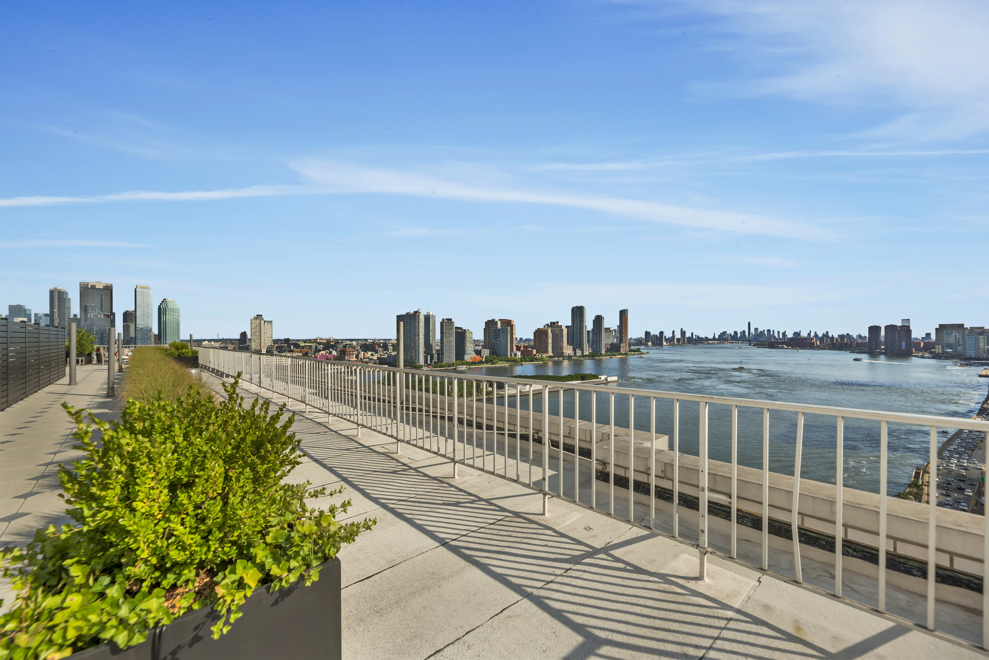 45 Sutton Place South, Unit 3D Manhattan, NY 10022 - Photo 11 of 16 a view of city with ocean view