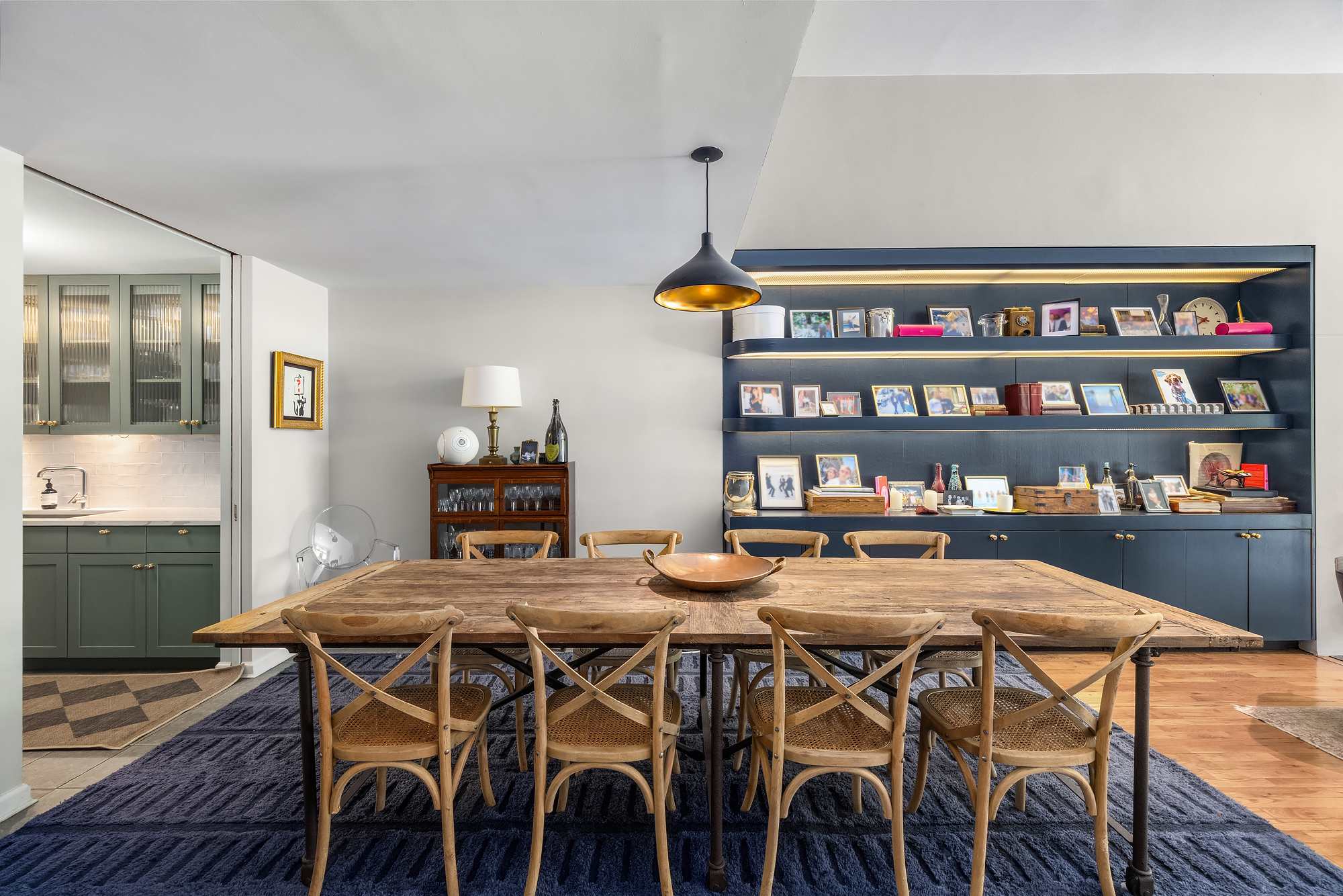 430 West 23rd Street, Unit C Manhattan, NY 10011 - Photo 7 of 16 a view of a dining room with furniture and wooden floor