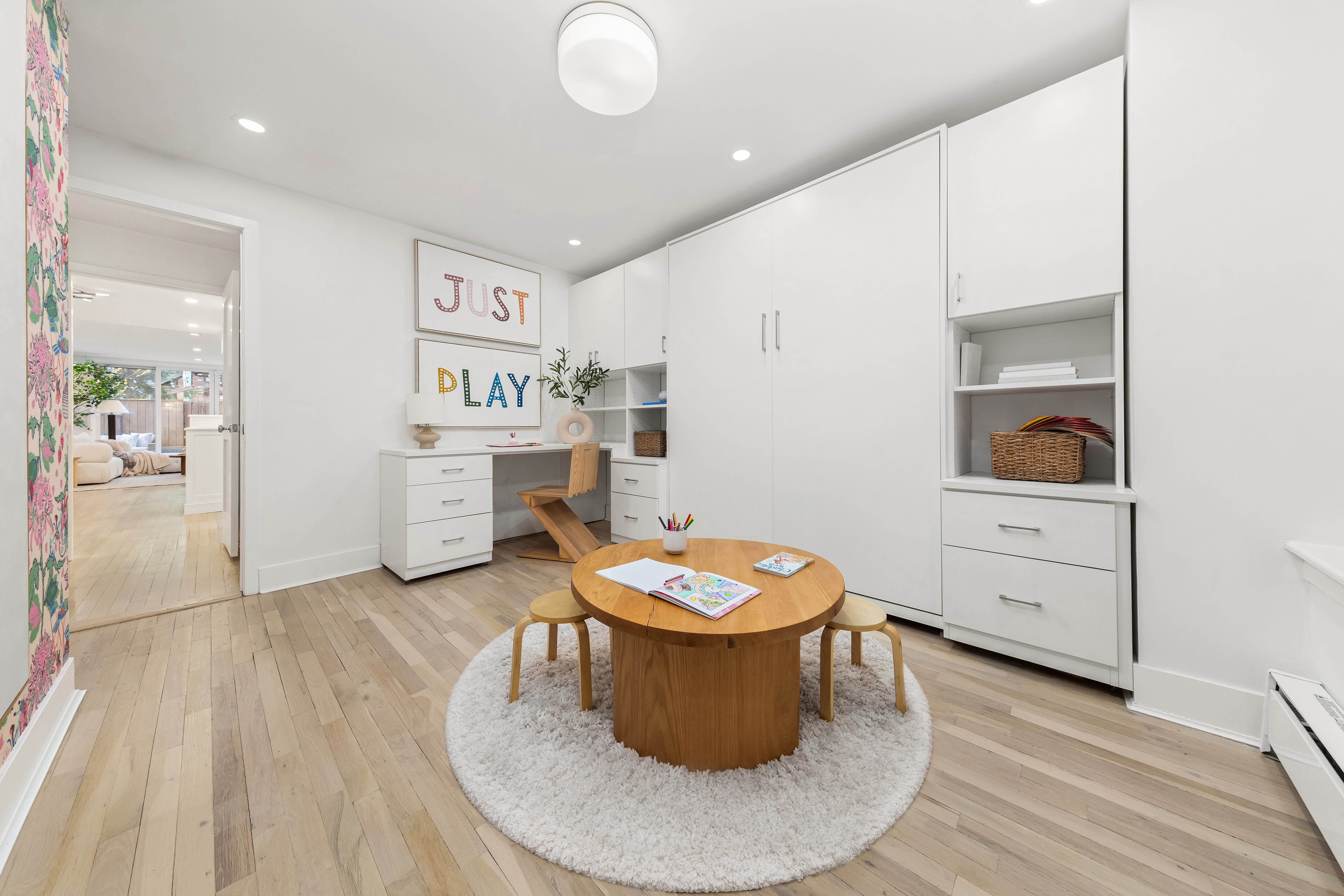 31 West 93rd Street, Unit 1D Manhattan, NY 10025 - Photo 12 of 18 a living room with furniture and wooden floor
