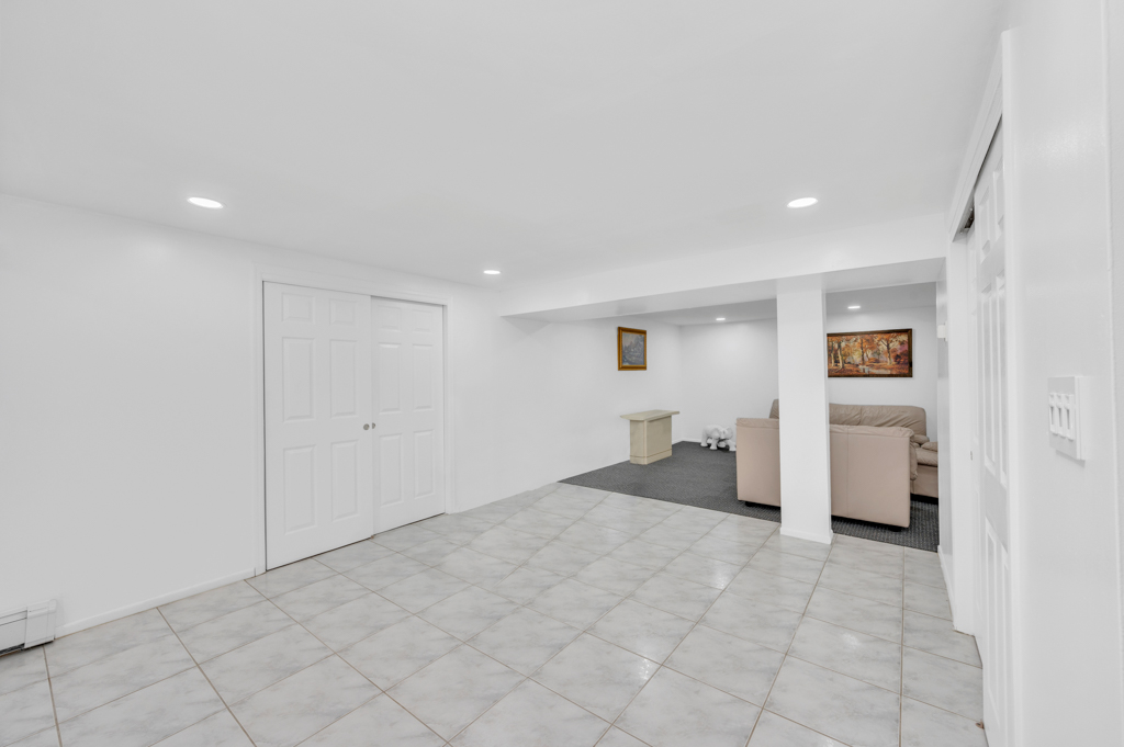 35 Poe Street Staten Island, NY 10307 - Photo 24 of 36 a view of a livingroom and a kitchen with furniture