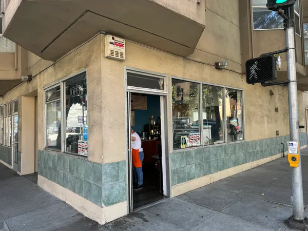 a view of a hallway with a outdoor space