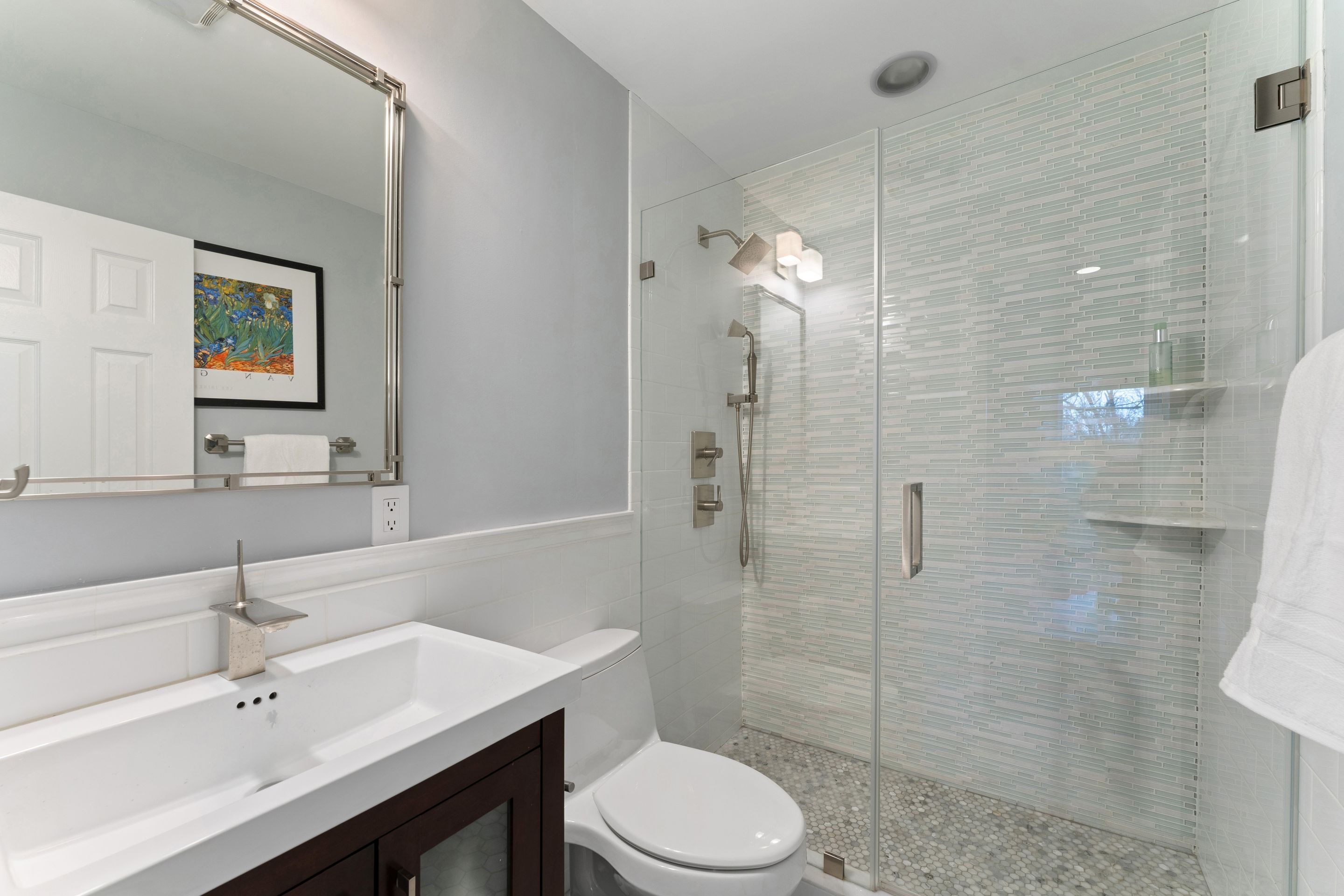 124 Boulder Ridge Road Scarsdale, NY 10583 - Photo 21 of 31 a bathroom with a sink a toilet and shower