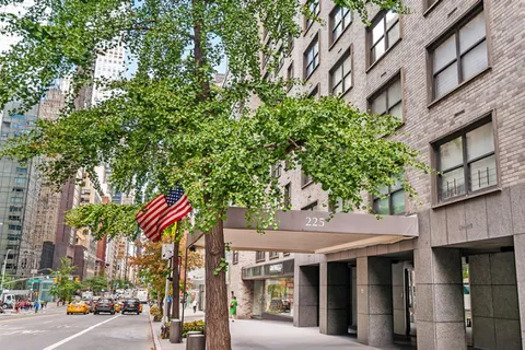 a view of a building with a tree