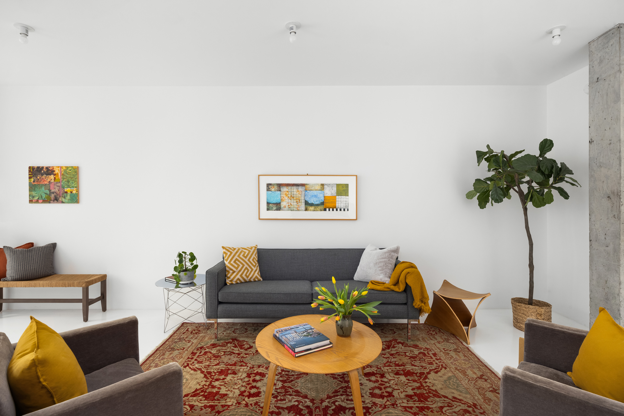 272 Greene Avenue Brooklyn, NY 11238 - Photo 3 of 22 a living room with furniture and a couch