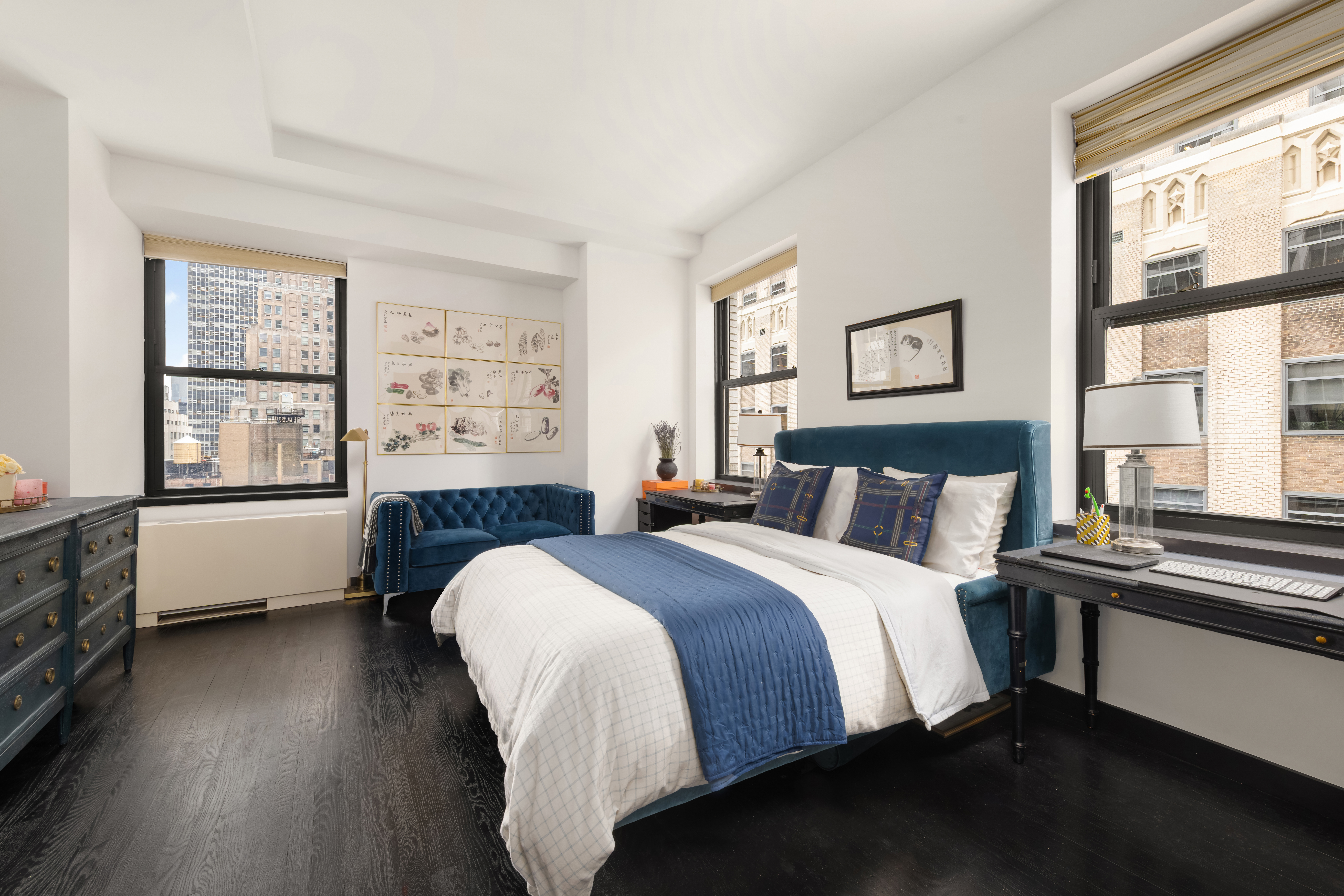 20 Pine Street, Unit 1802 Manhattan, NY 10005 - Photo 5 of 10 a bedroom with a bed and a large window