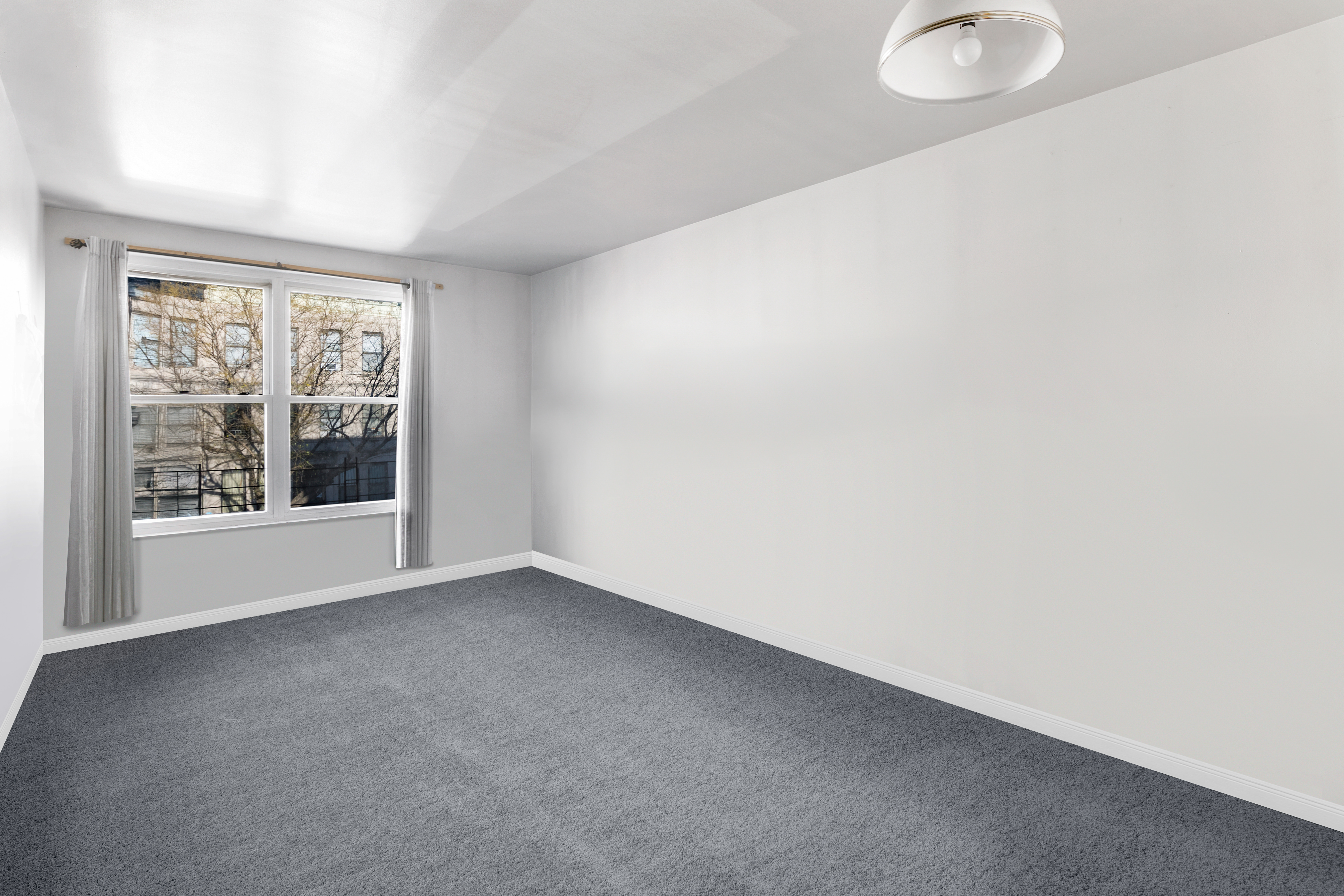 364 Chauncey Street Brooklyn, NY 11233 - Photo 10 of 17 a view of an empty room with a window