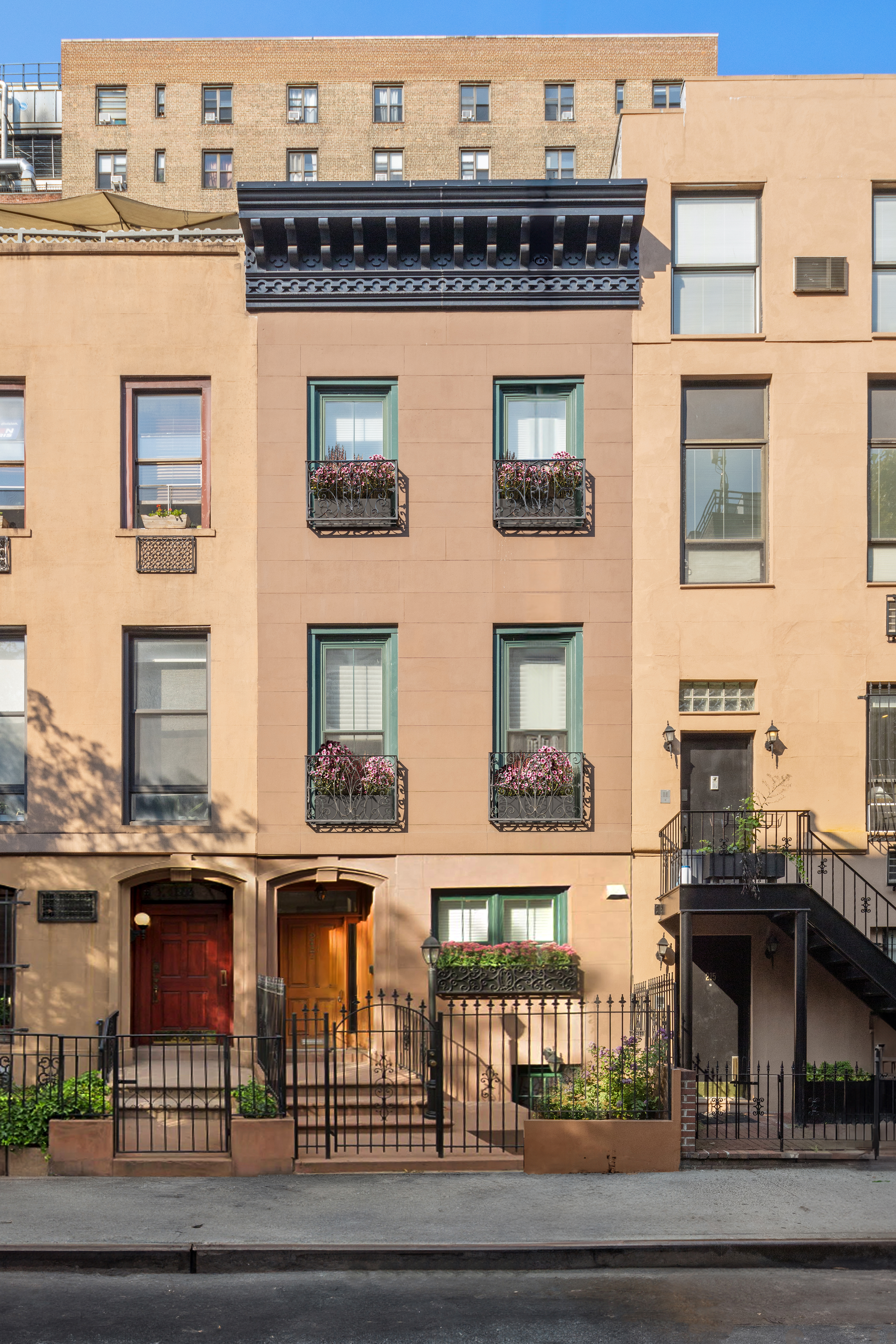 217 West 22nd Street Manhattan, NY 10011 - Photo 15 of 16 a front view of a building with glass windows