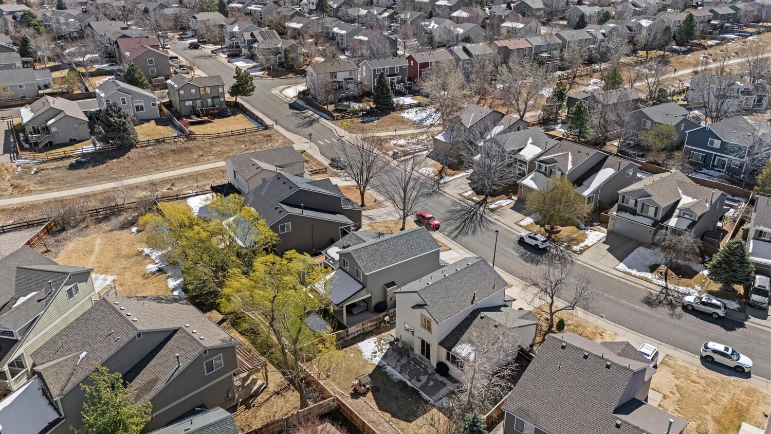 847 Timbervale Trail Highlands Ranch, CO 80129 - Photo 35 of 36 an aerial view of a city