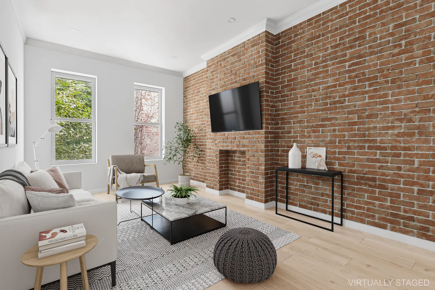 a living room with furniture a flat screen tv and a fireplace