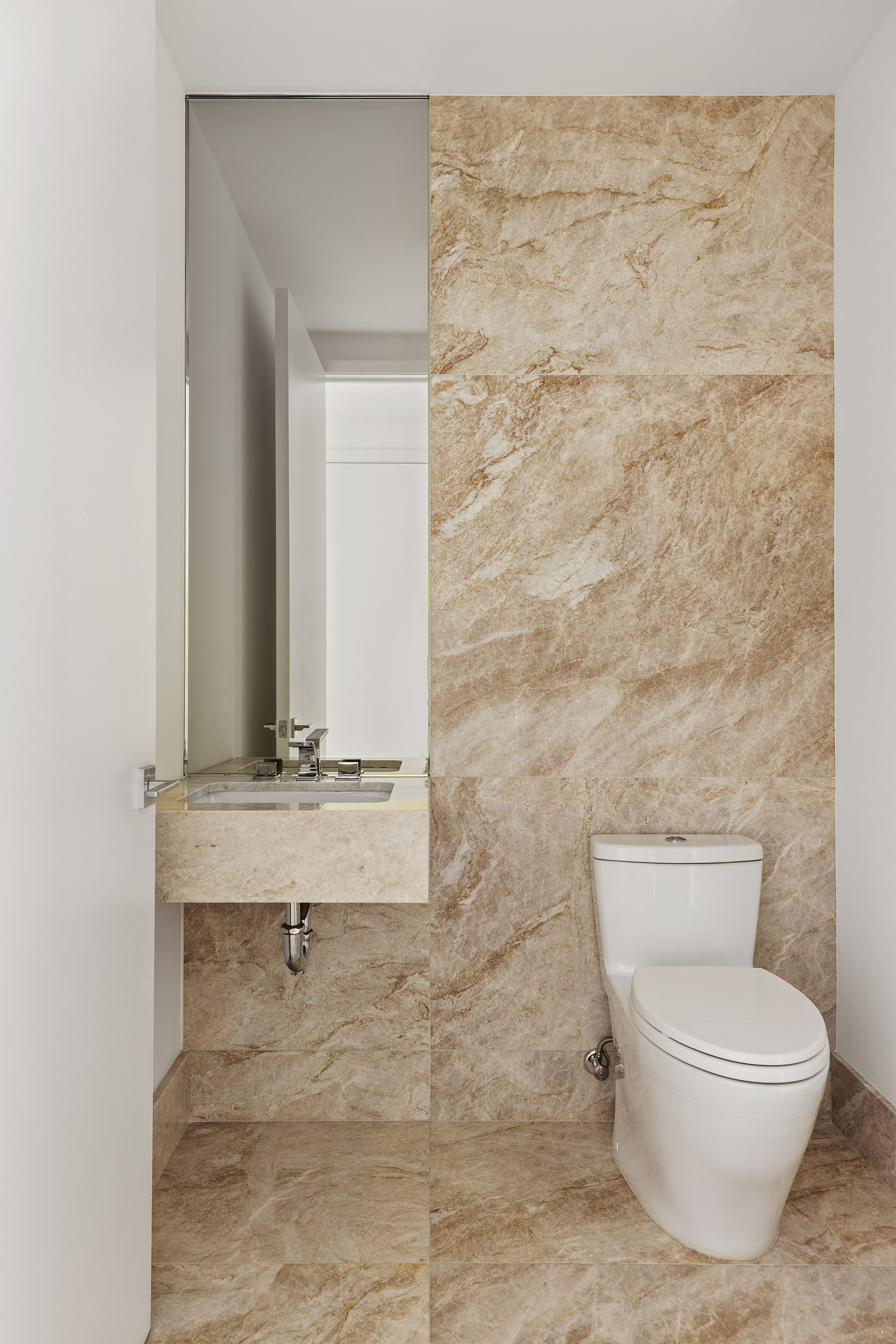 15 Hudson Yards, Unit 68C Manhattan, NY 10001 - Photo 14 of 16 a bathroom with a toilet and a sink