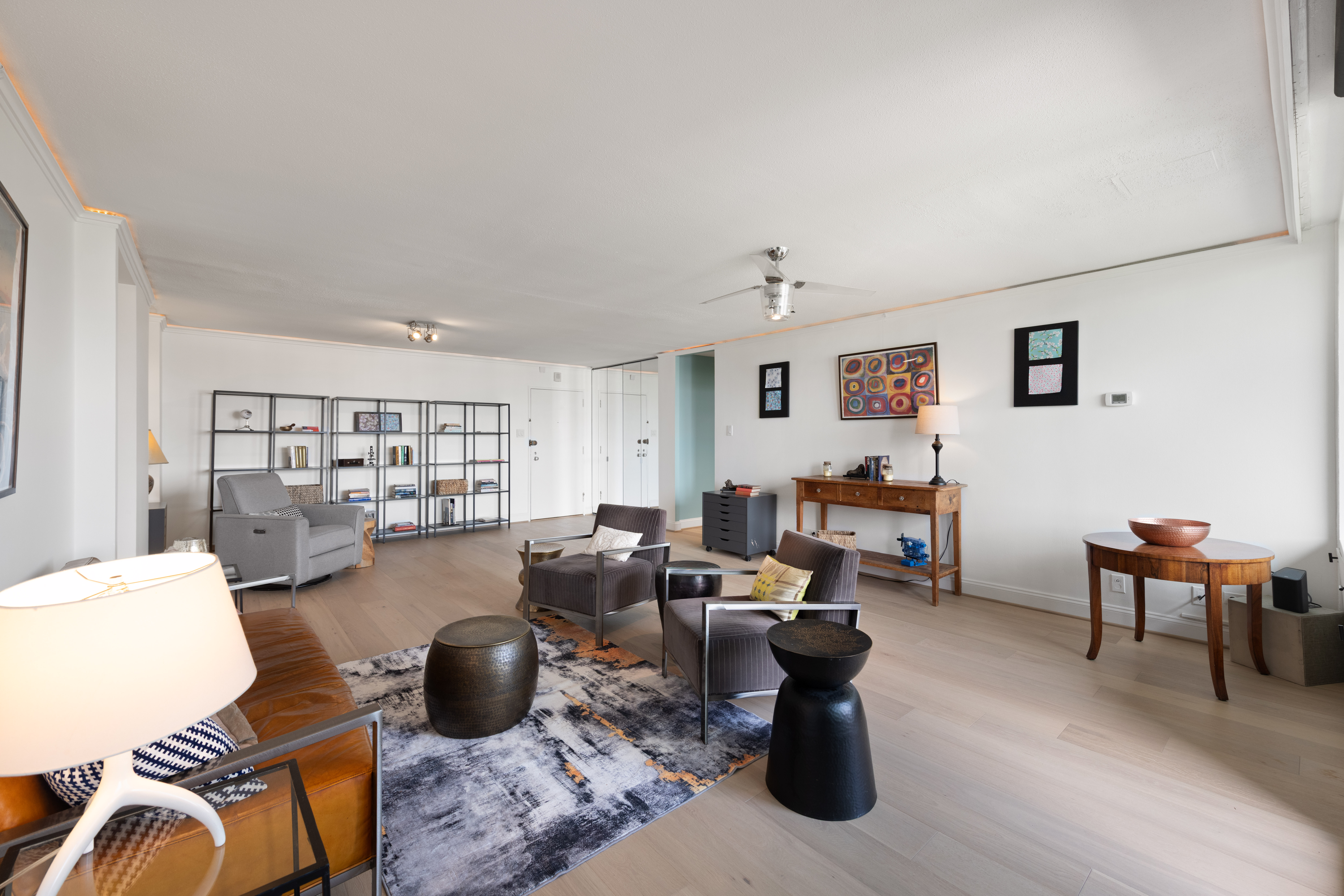 490 M Street Southwest, Unit W802 Washington, DC 20024 - Photo 6 of 24 a living room with furniture and a window