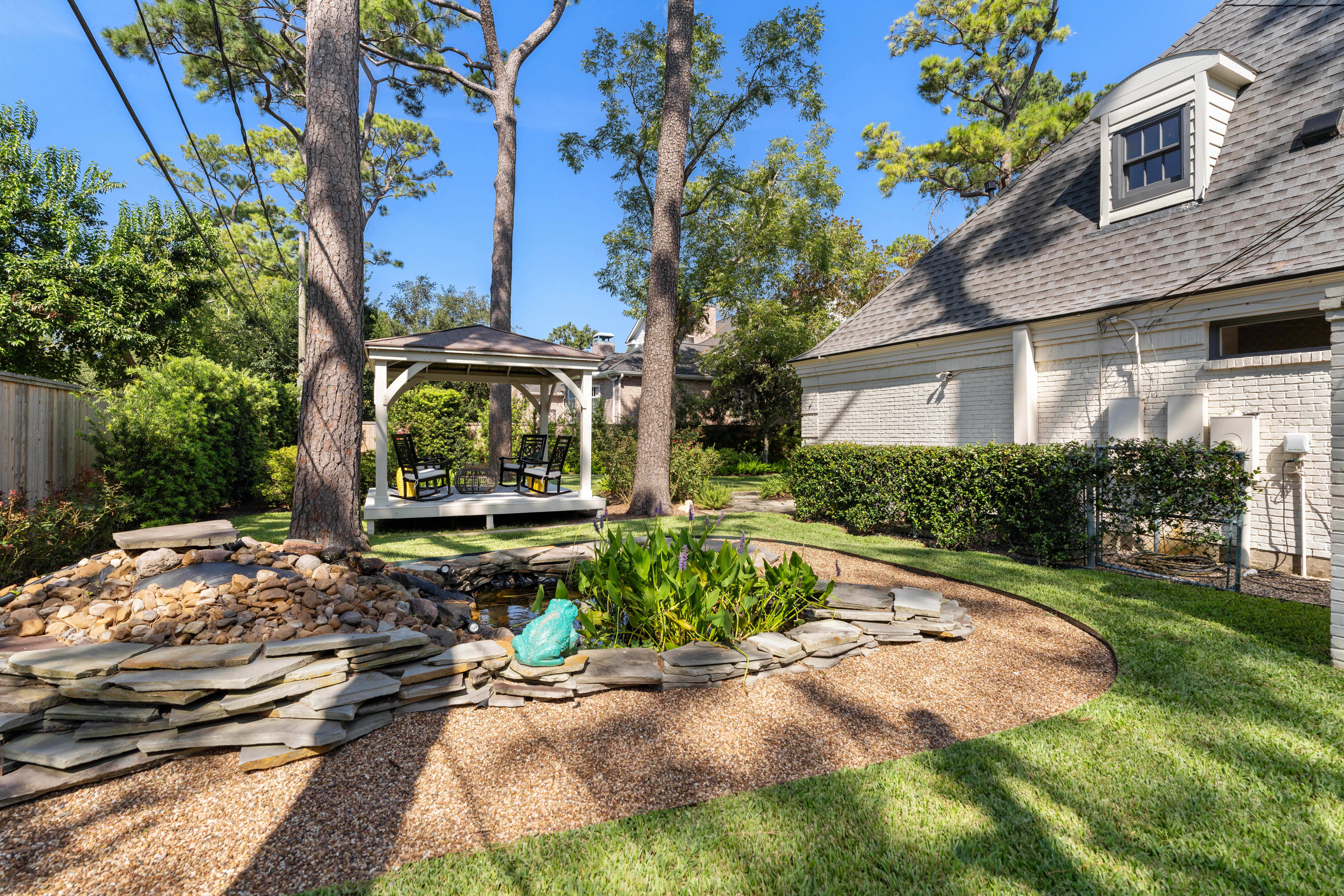 711 Pifer Road Houston, TX 77024 - Photo 46 of 53 a front view of a house with a yard