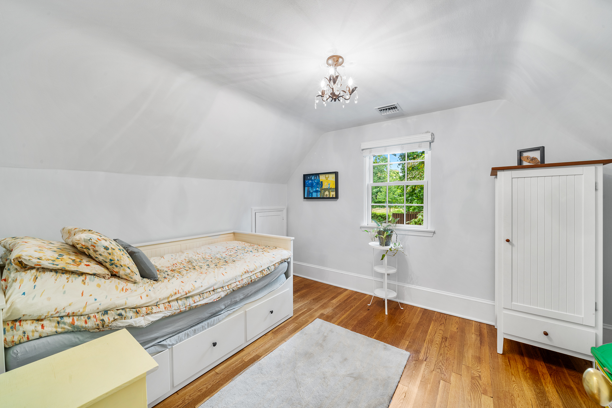 718 Arlington Road Narberth, PA 19072 - Photo 25 of 47 a bedroom with a bed and wooden floor