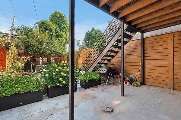752 Jefferson Avenue, Unit GARDEN Brooklyn, NY 11221 - Photo 6 of 8 a view of a house with a yard