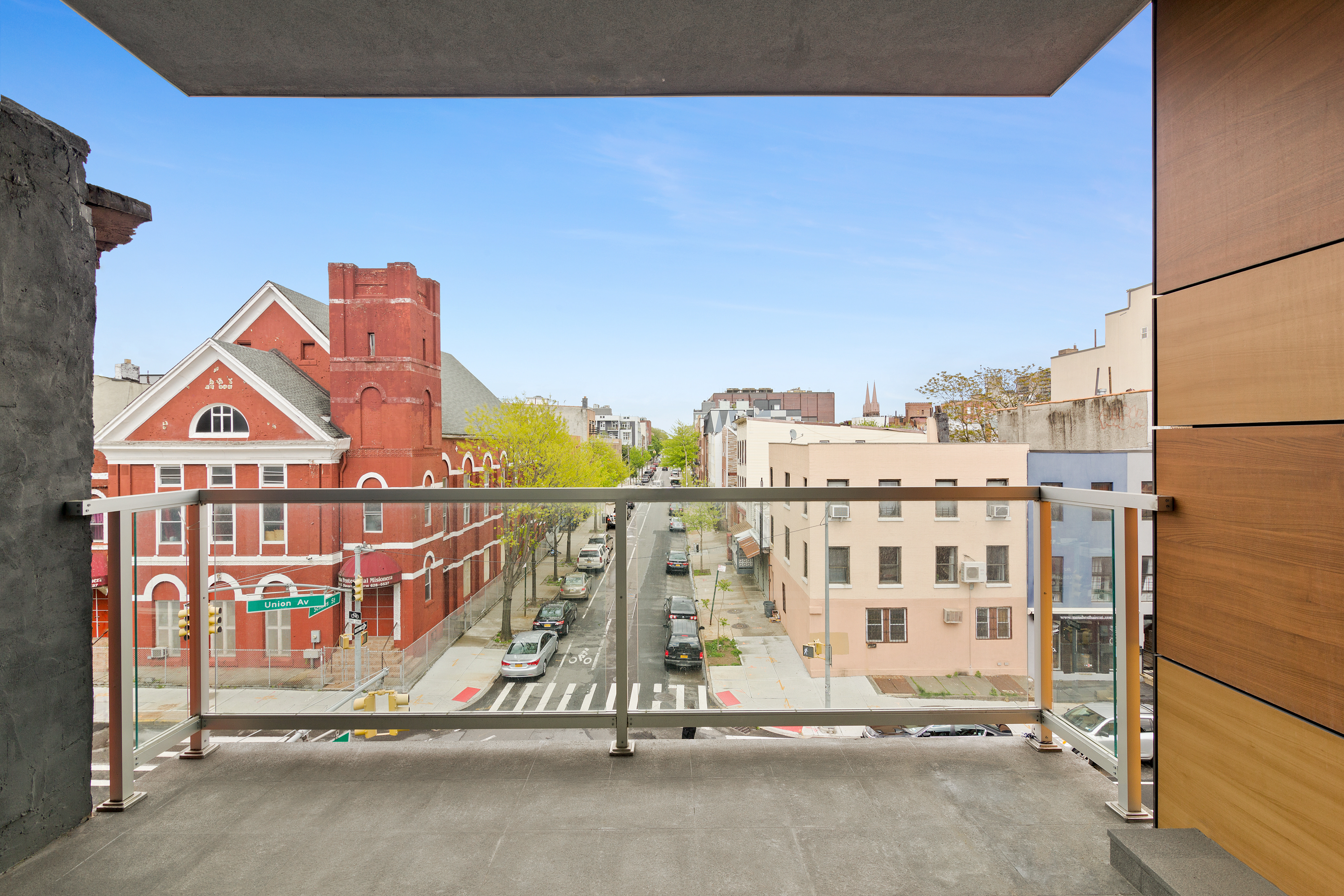 261 Union Avenue, Unit 4 Brooklyn, NY 11211 - Photo 2 of 13 a view of a city street with building