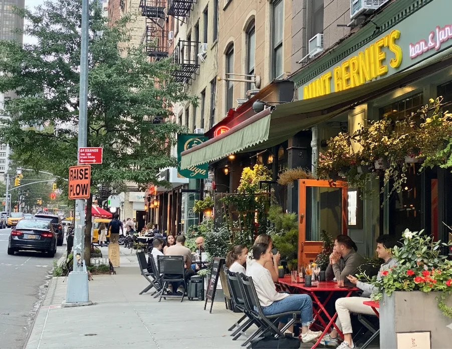 a view of street with sitting area