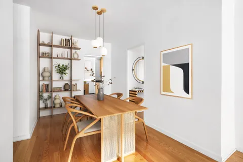 a view of a livingroom with furniture and window