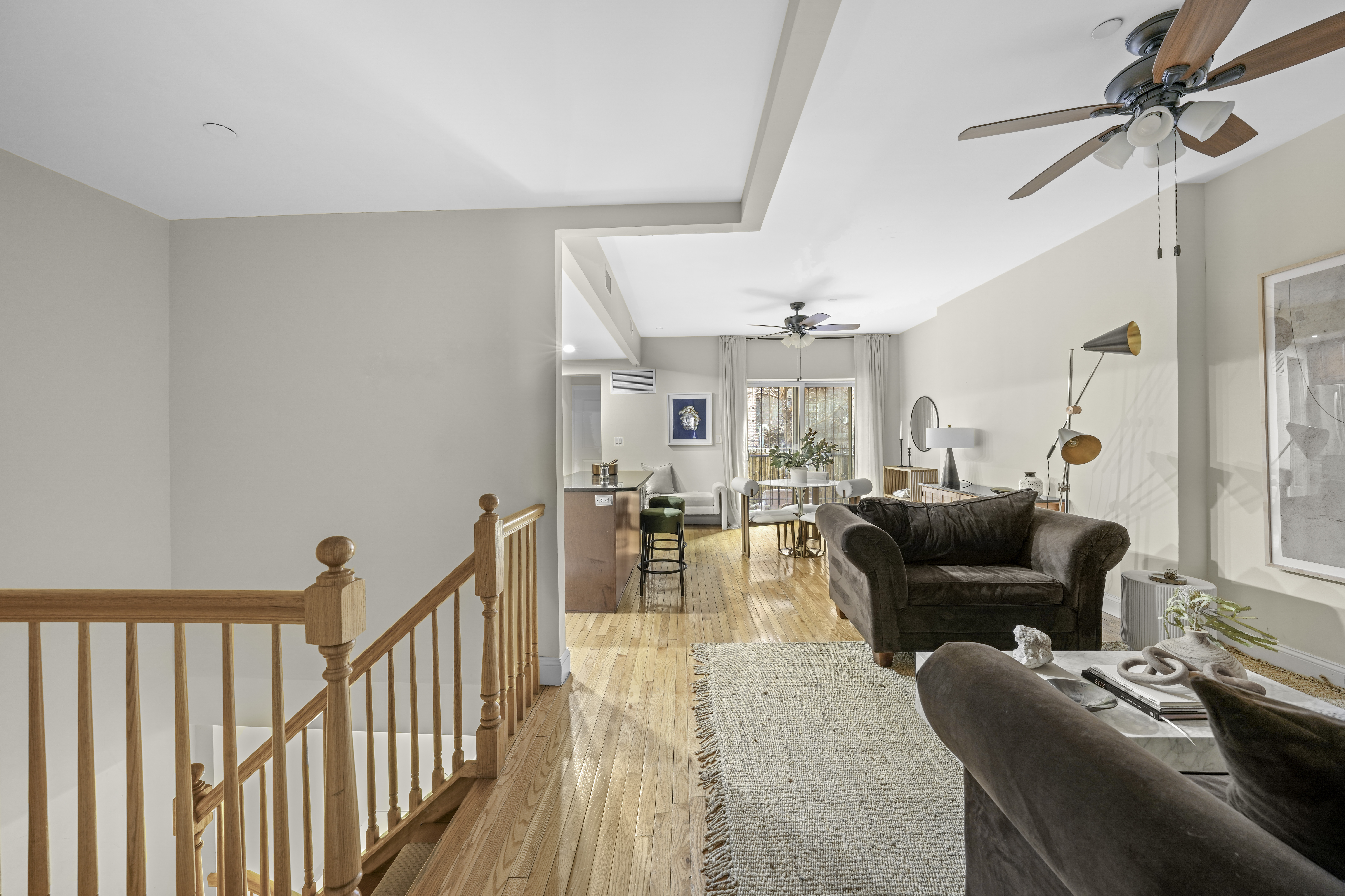 714 St Nicholas Avenue, Unit 1 Manhattan, NY 10031 - Photo 1 of 18 a living room with furniture and a table