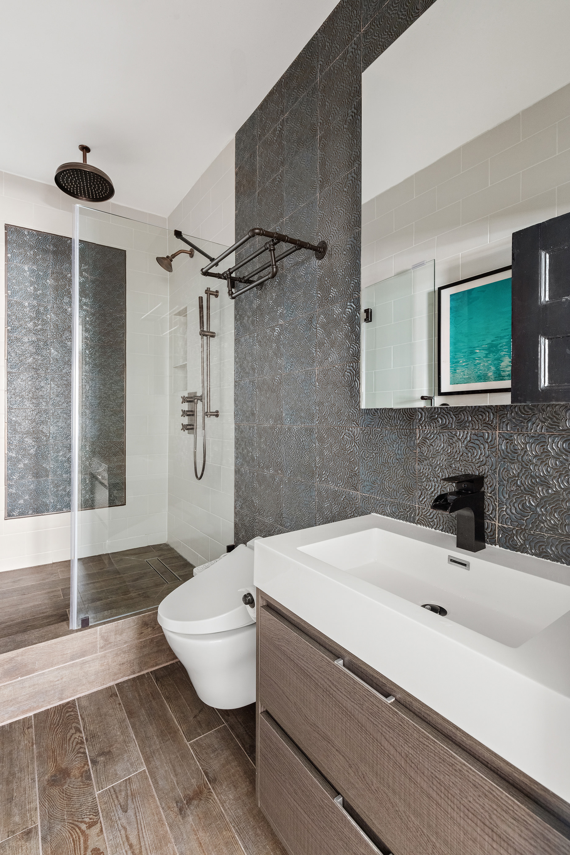 311 West 97th Street, Unit 5N Manhattan, NY 10025 - Photo 14 of 16 a bathroom with a sink a toilet and shower