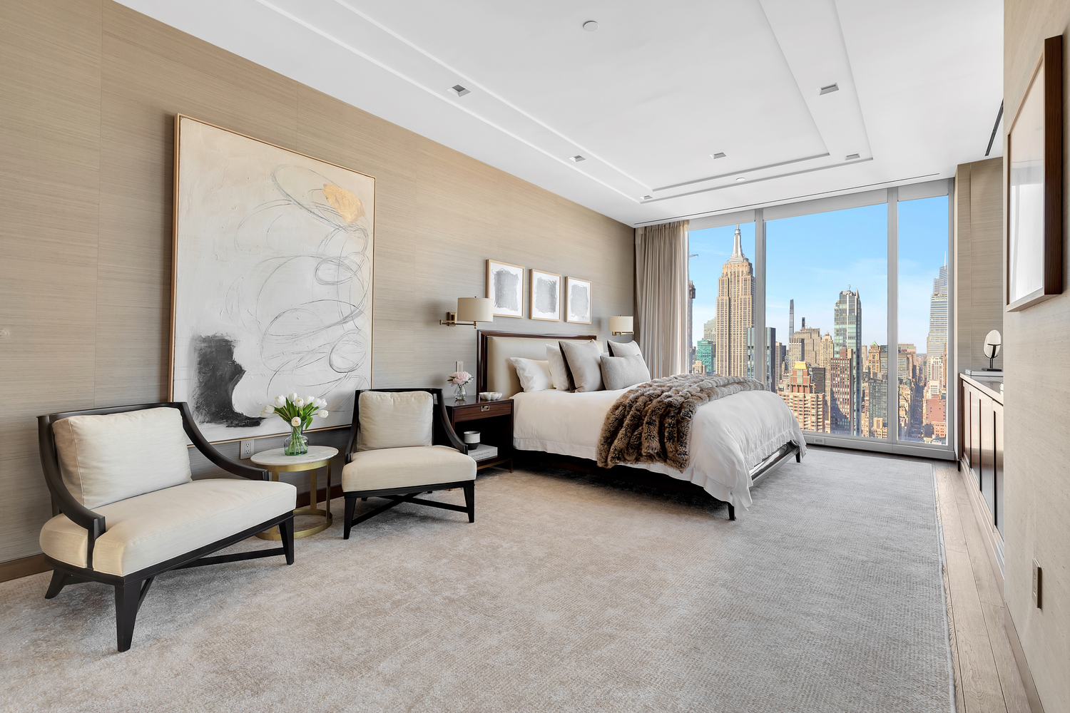 23 East 22nd Street, Unit PH Manhattan, NY 10010 - Photo 9 of 32 a bedroom with a bed and a couch