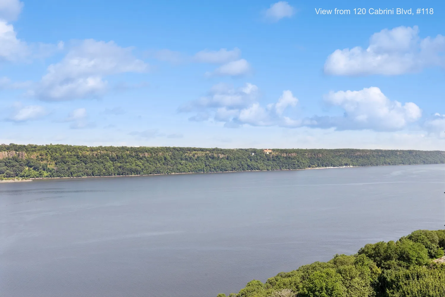 a view of a lake and mountain in the back